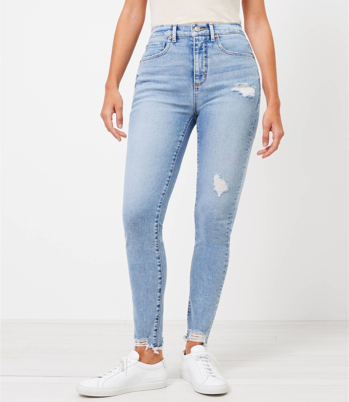 Curvy Chewed Hem High Rise Skinny Jeans in Pure Light Indigo Wash | LOFT | LOFT