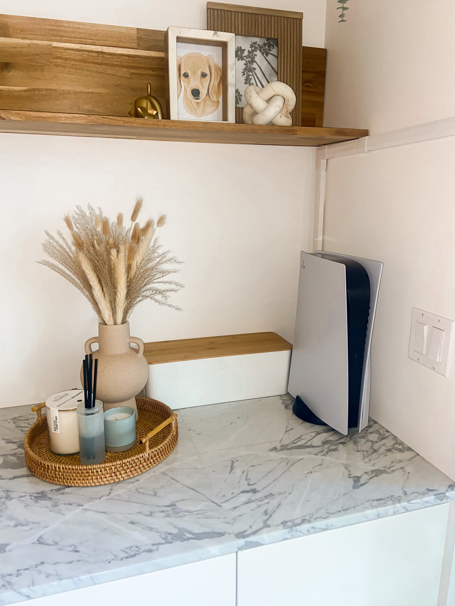 PSA: CORD ORGANZIERS! You can have both function AND beauty! This cord box is housing a power strip with 8 things plugged in 🤯 The wall cord concealer strip is secured with command hooks being renter friendly and is paintable so it can blend seamlessly with your wall 

#LTKhome #LTKstyletip #LTKunder50