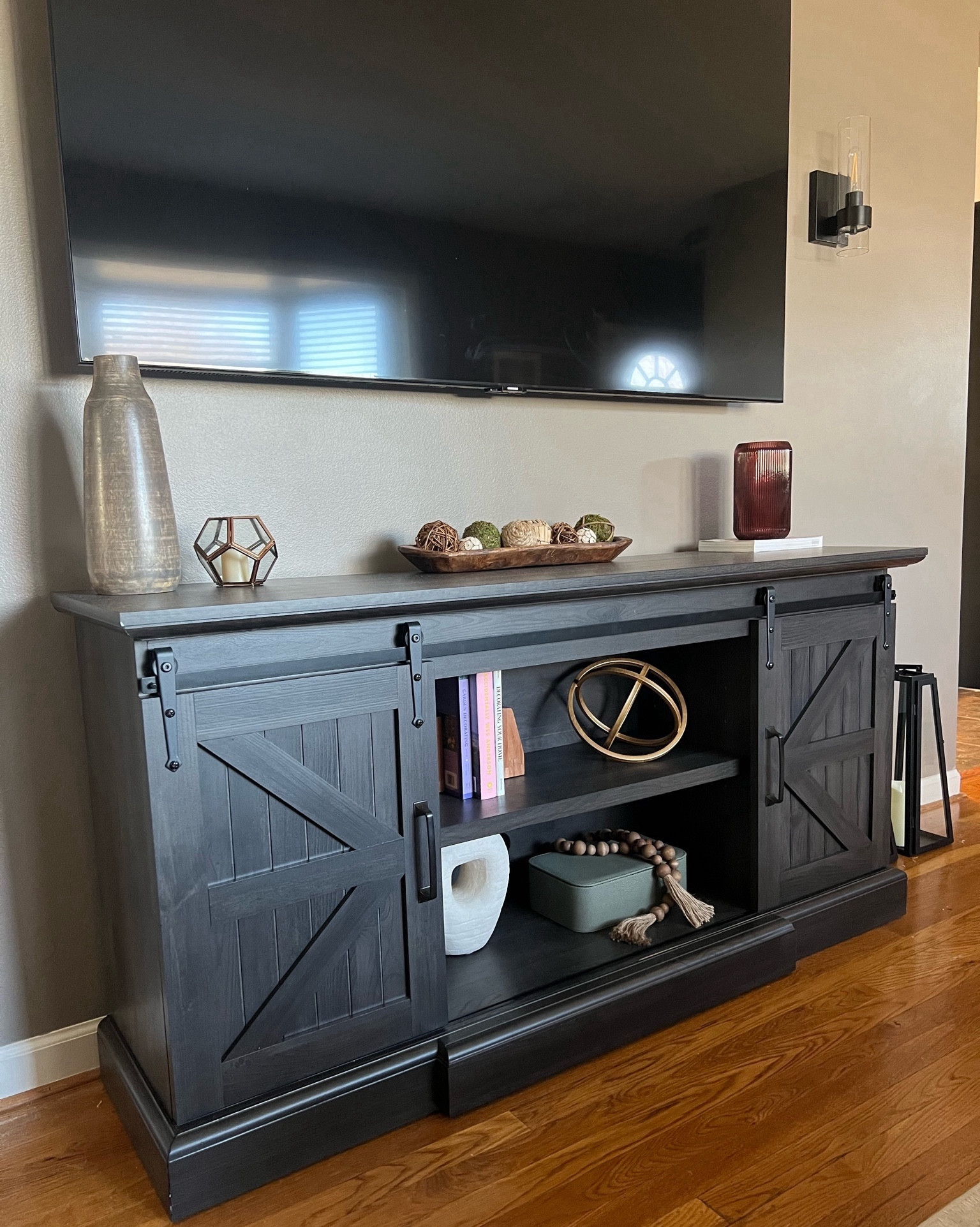 Minimal spring decor 

Tv console styling, tv stand decor, shelf styling, shelf decor, vases, bookends, shelf pieces  

#LTKhome #LTKSpringSale #LTKSeasonal