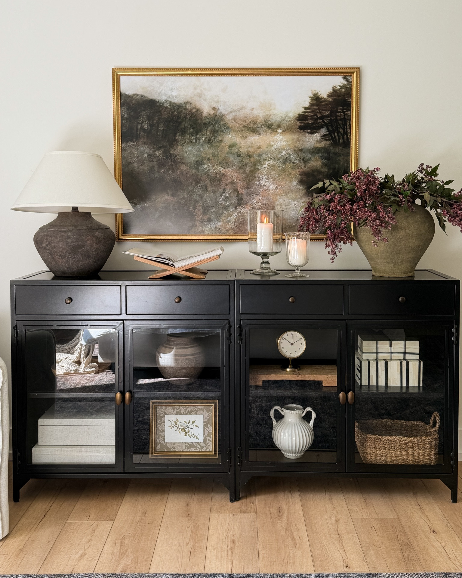 I don’t share this space super often so I figured I’d share it today. This is actually two cabinets that I turned into a sideboard and I love how it turned out. It created such a statement.

My mil actually bought the media cabinet version of this cabinet, which has a similar vibe. It’s a little shorter so you can put a tv over/on it.