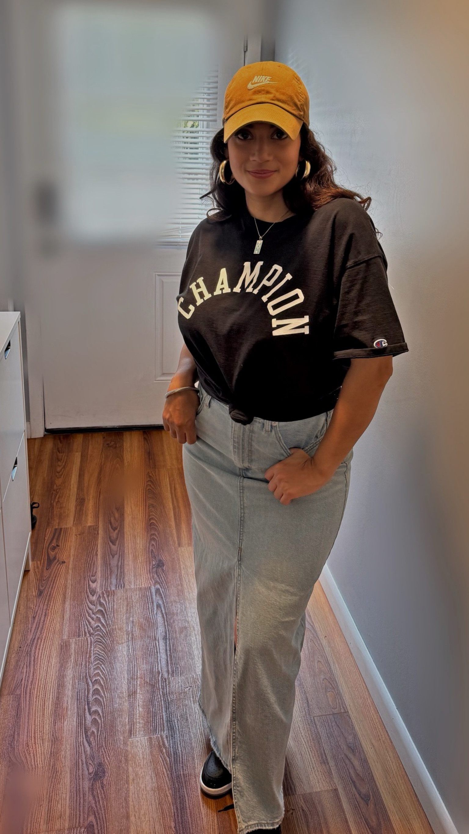 Casual yet chic 🤍 Keeping it laid-back with my oversized Champion tee and denim skirt, paired with a tan cap for that neutral vibe. Effortless style for a busy day! #ModestFashion #CasualStyle #OOTD #TanAndDenim #Champion

#LTKStyleTip