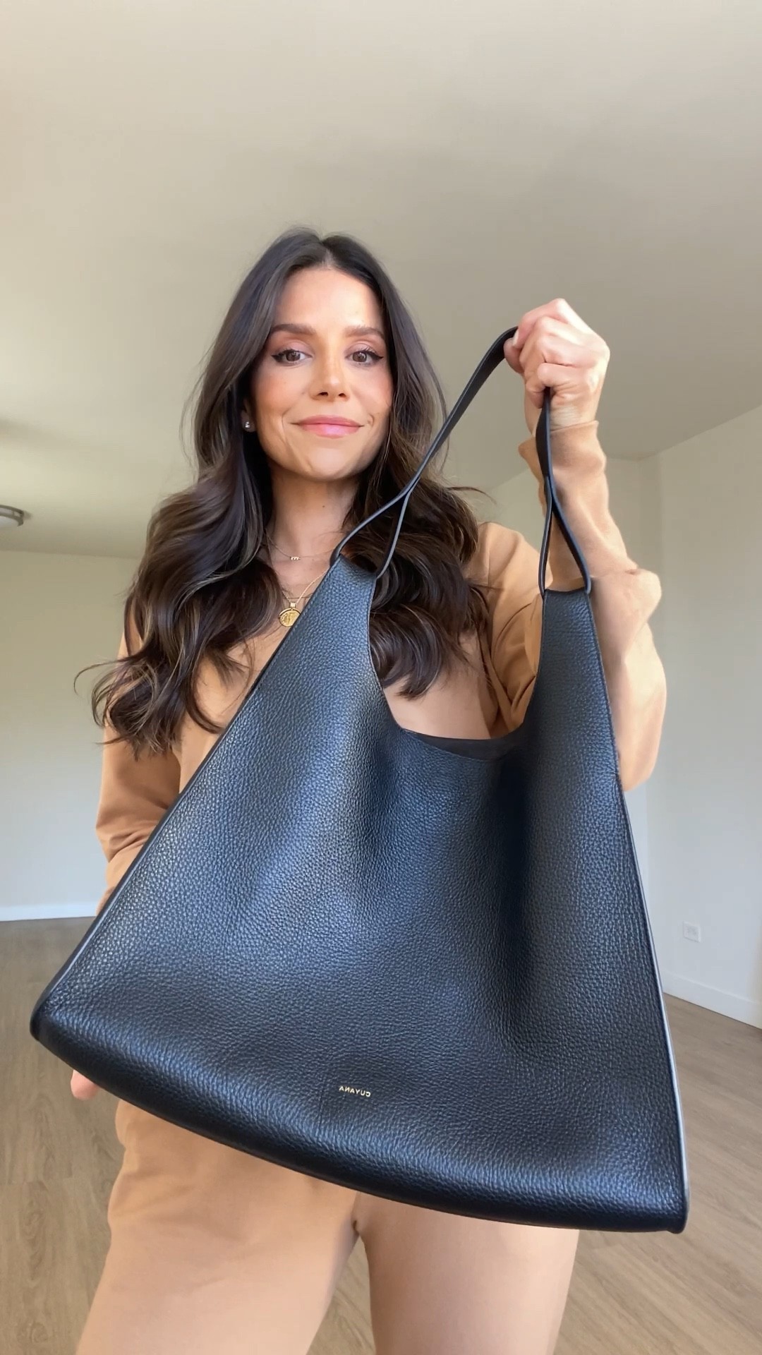 My everyday bag by @cuyana. The gorgeous Oversized Double Loop Bag has a timeless design that looks good with all my work and travel outfits. #cuyanapartner

#LTKitbag #LTKworkwear #LTKtravel