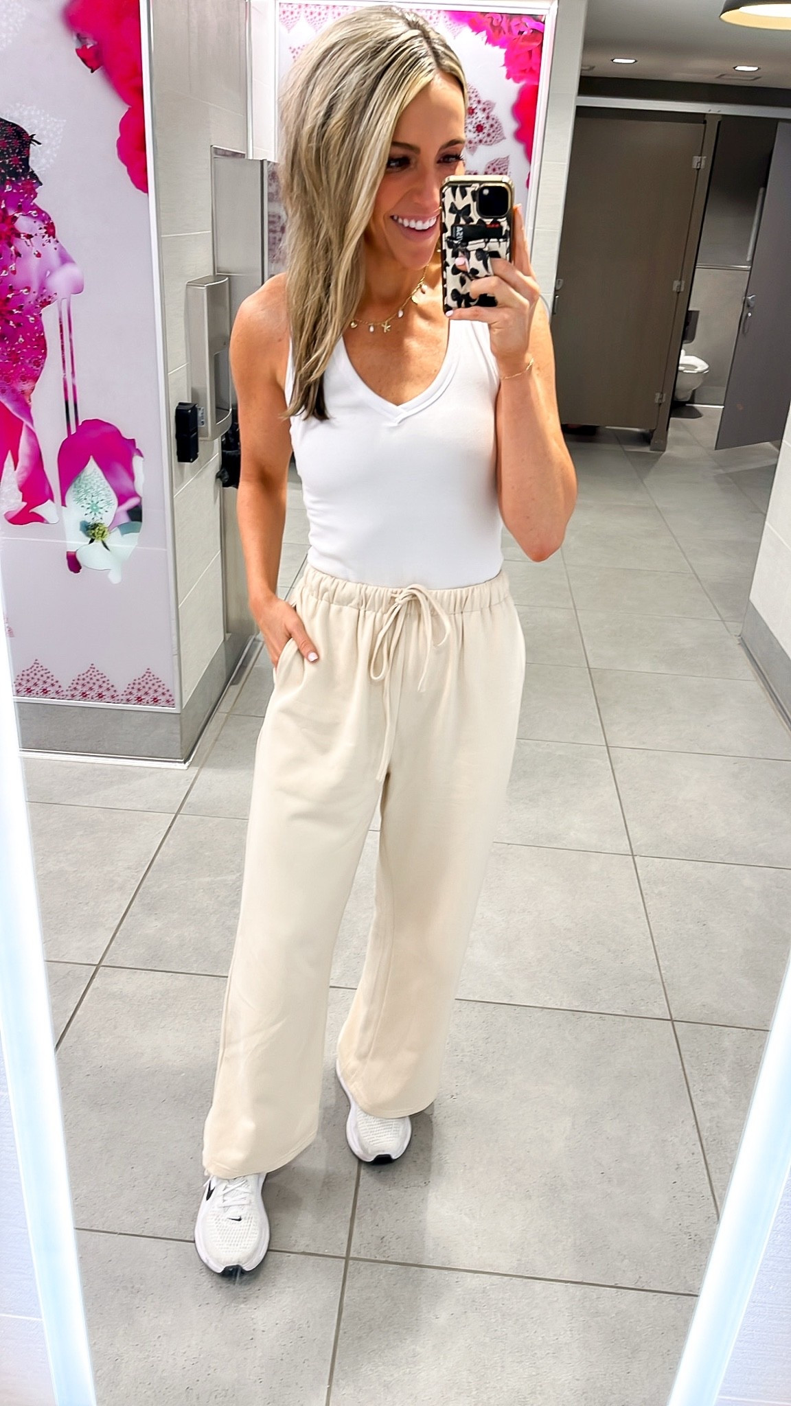 Travel-ready outfit! Wrinkle resistant lounge pants! Stretchy, drawstring waistband. Tank has built in bra! Wearing xs in all. Perfect for a business trip or a weekend getaway.

#LTKTravel #LTKootd #LTKSeasonal