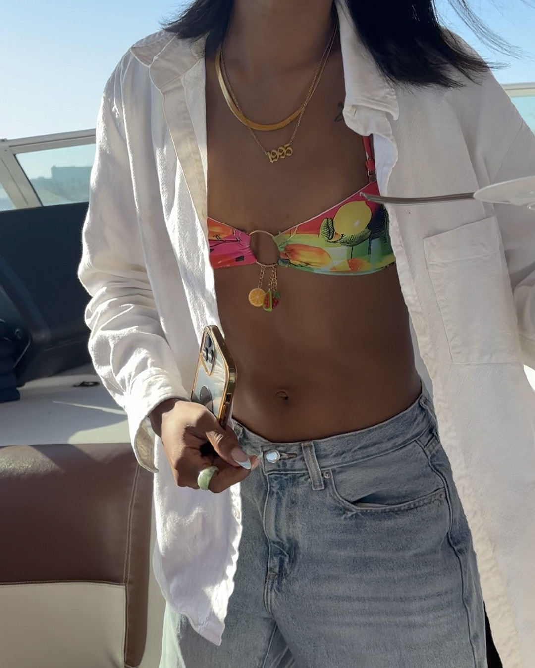 Vacation OOTD! Love wearing my swimsuit with jeans on the boat to stay warm on windy days, threw on a button up as an added piece since I wasn’t swimming.

✨Jeans - universal thread 90s baggy (target size 2)
✨Swimsuit - can’t link but found cute similar ones on boohoo
✨Top - linen blend boyfriend shirt (old navy size xxl) 
✨Sunglasses - can’t link but they are Braindead Staunton in Green Granite/Green, another cute pair linked
✨moves - I got em from my mama 🫶🏽😘

#LTKSwim #LTKFindsUnder100 #LTKStyleTip