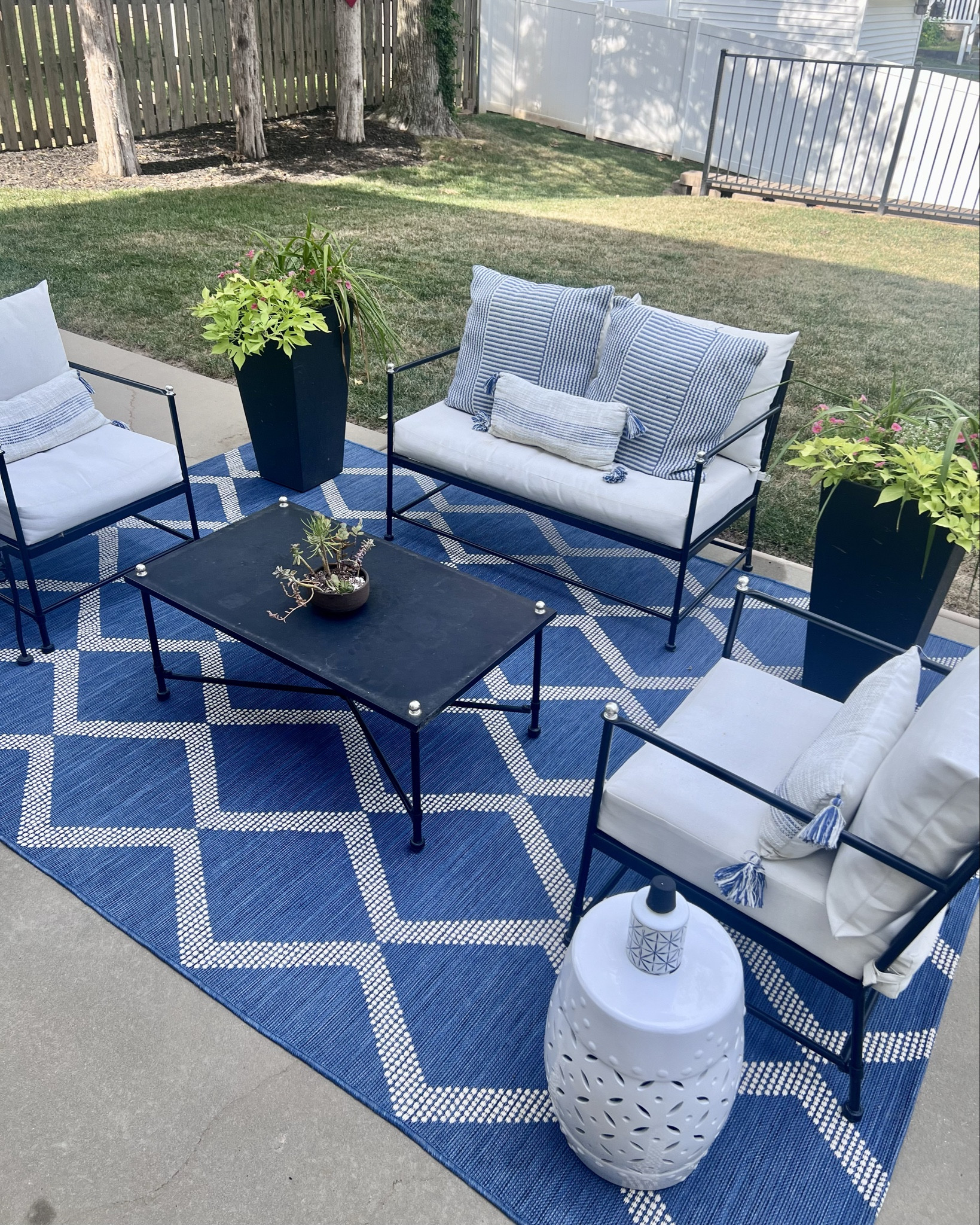 Just added this blue and white outdoor rug on our patio and it makes such a difference!!! It grounds the space and makes it so inviting for outdoor living. Now, if it would just cool down 🥵

#LTKVideo #LTKSeasonal #LTKHome