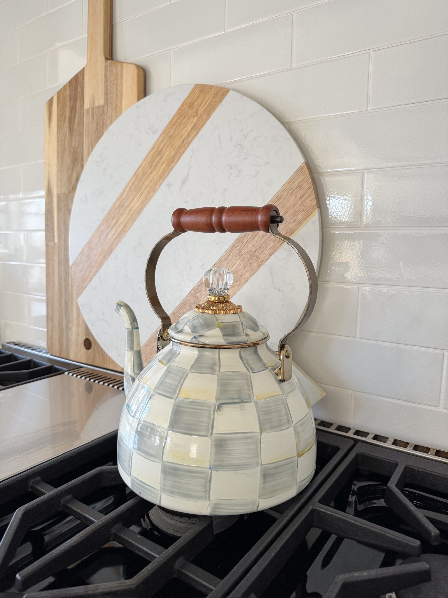 One of my favorite ways to style kitchen decor: wood and marble cutting boards! Functional and add nice texture. 


#LTKHome