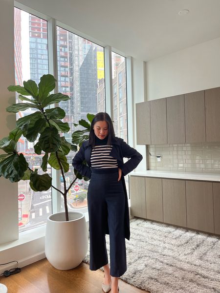 Navy workwear outfit - Theory crepe draped soft trench coat, striped mock neck sweater tank, wide leg culotte trousers. Spring workwear outfit. 

#LTKworkwear #LTKSpringSale #LTKstyletip