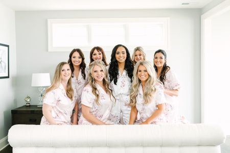 Bride & Bridesmaid Getting Ready Outfits! These white and pink floral pajamas were so pretty and easy to remove once hair & makeup were finished! 

#LTKwedding #LTKHoliday #LTKSeasonal