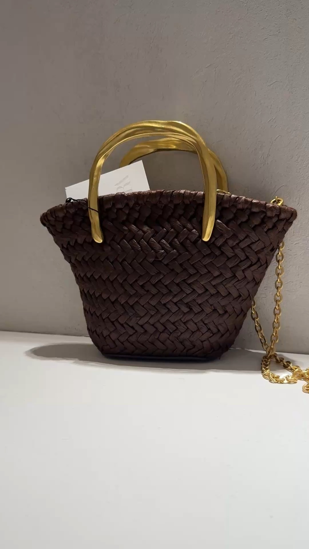Brown basket weave mini handbag with gold handles

#LTKootd