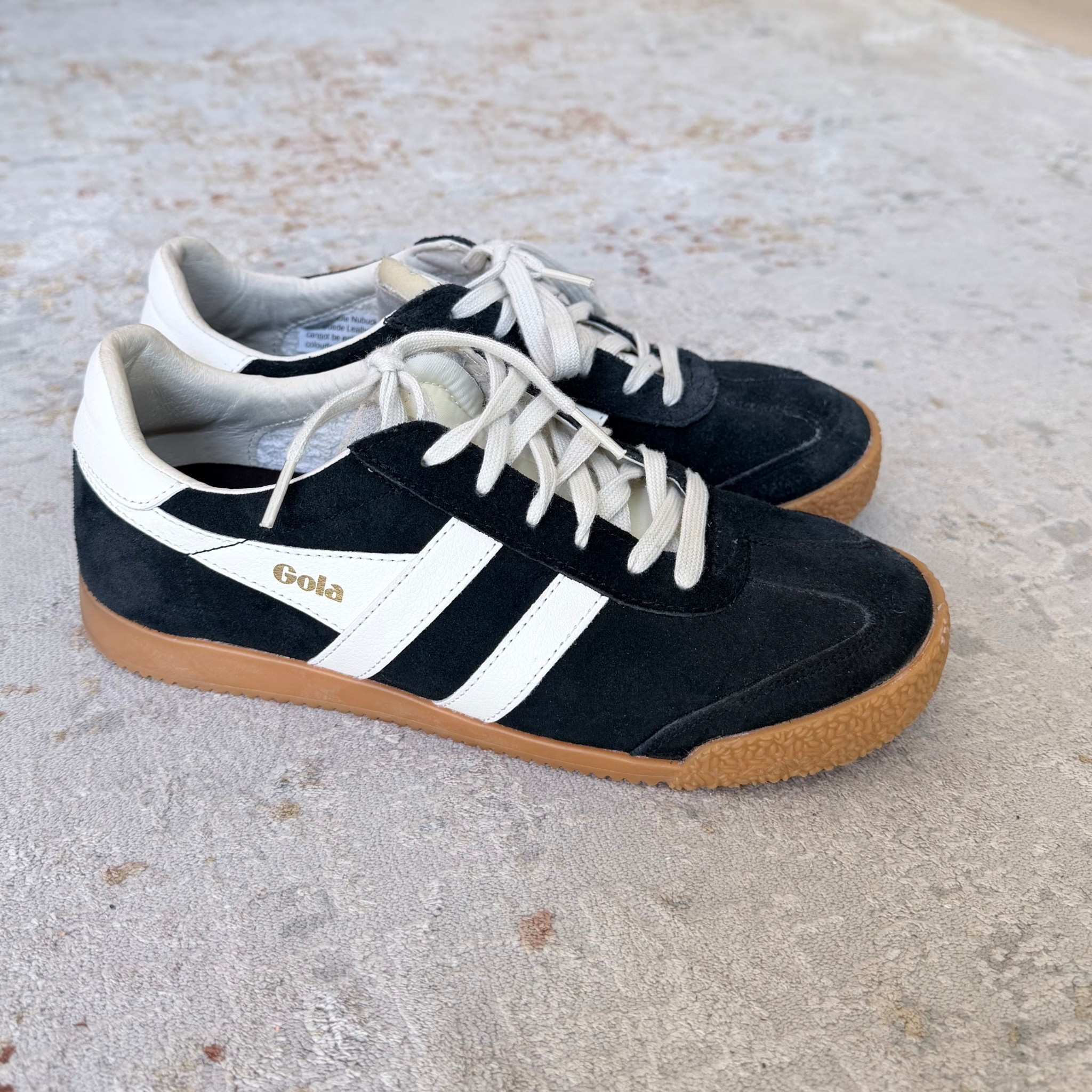 Black & white retro sneakers with gum sole.
The perfect everyday shoe—comfortable, versatile, and effortlessly chic. Pairs with denim, dresses, or casual sets.

#LTKTravel #LTKWorkwear #LTKOver40