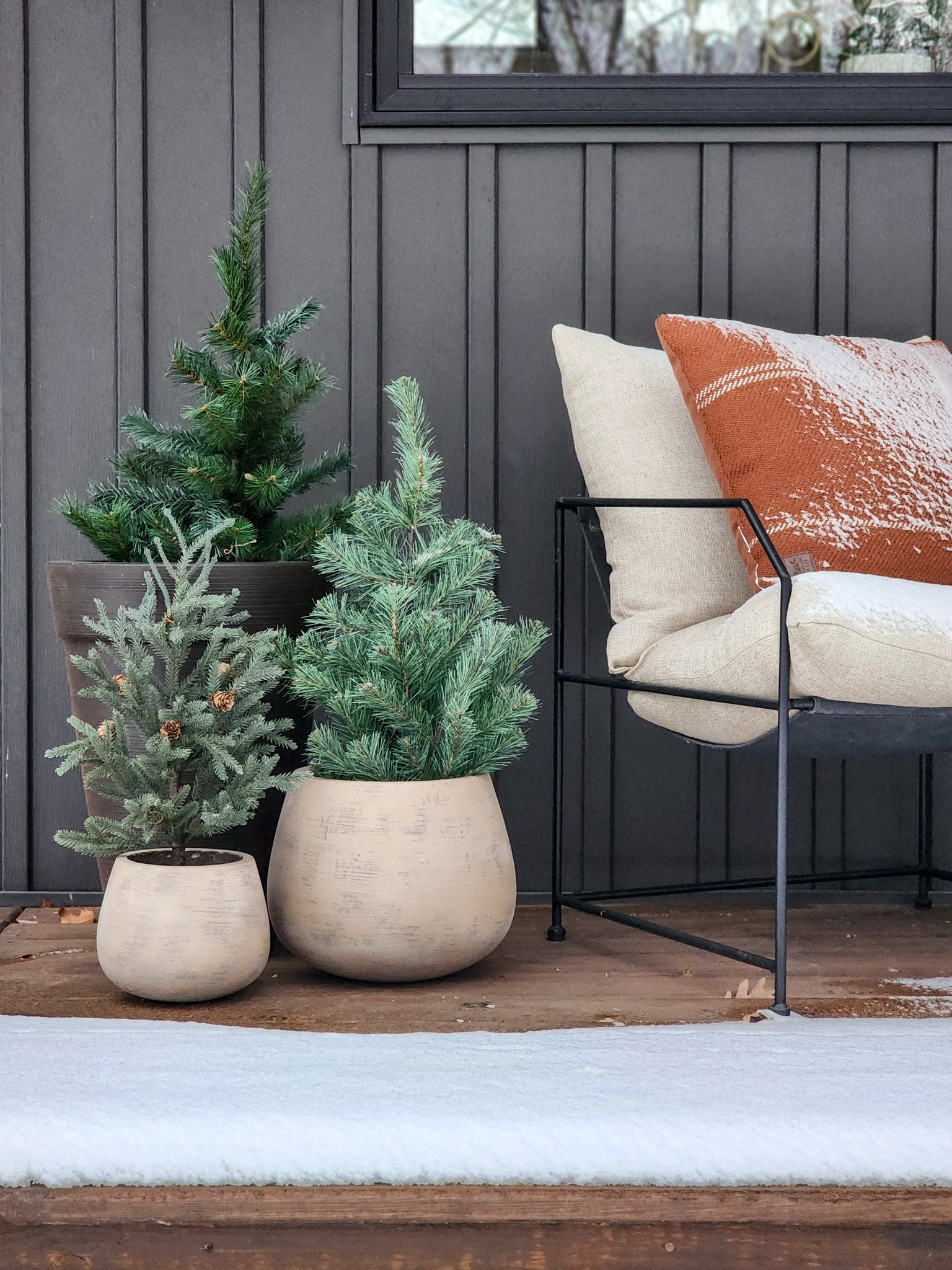 I'm going to be completely honest, I didn't switch out my pumpkins for pine trees until December 21st, the day we were hosting our extended family's Christmas party and I don't feel bad about it. 

While I simplified our front porch decor this year out of time constraints, I’m actually really happy with the look.


#LTKSeasonal #LTKHome