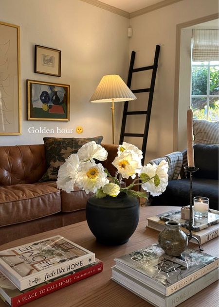 Golden hour 🌞
-
Living room decor. Floor lamp. Sofa. Leather sofa. Faux flowers. Coffee table. Table Book. Home decor  

#LTKSeasonal #LTKhome #LTKFind