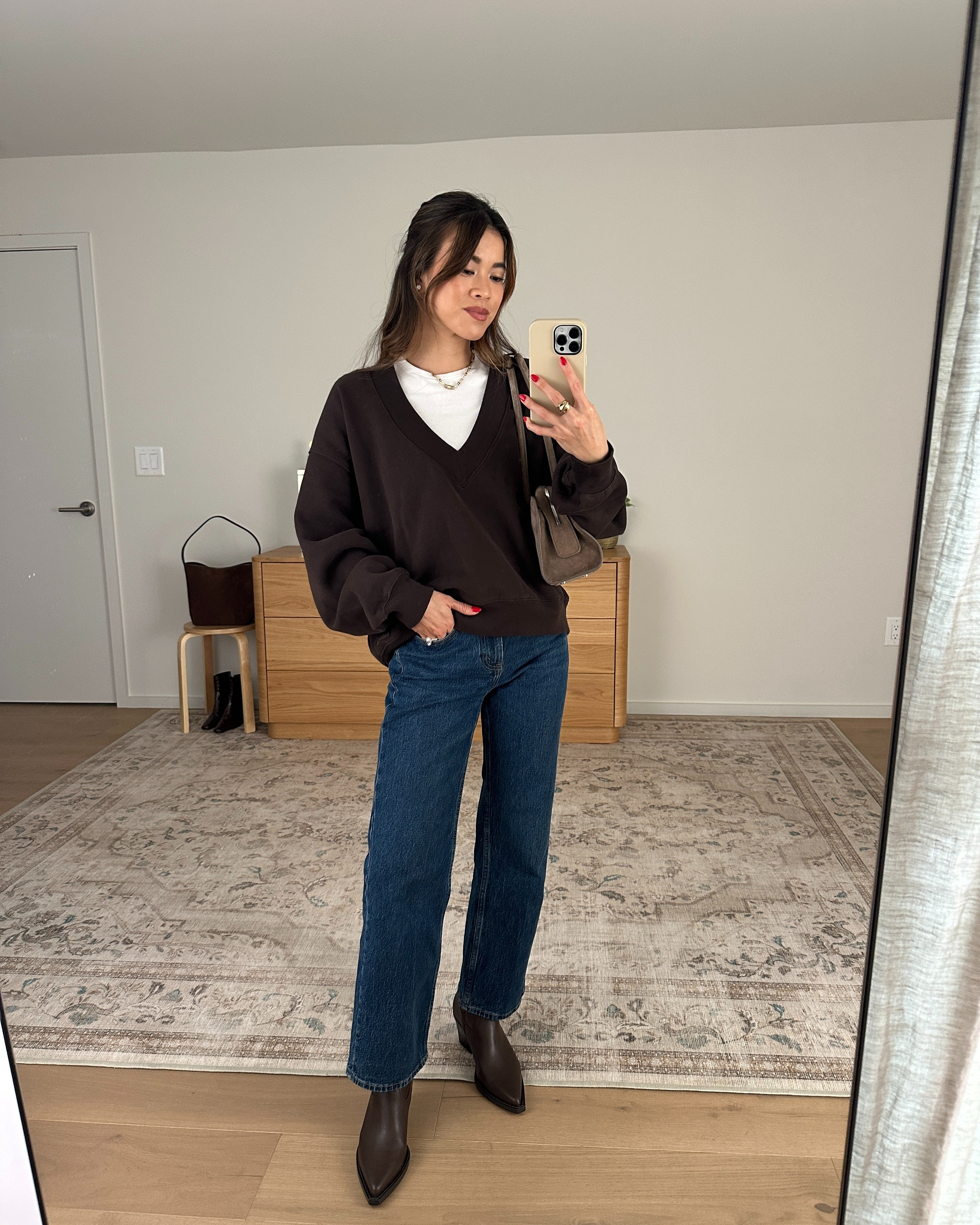 Workwear outfit inspo. I love this V neck sweatshirt from @Aritzia.

Sizing info:
-Abercrombie High Rise 90s Relaxed Jeans (Size 23 Extra short in Dark Wash)
-Aritzia HomeStretch Rib Tune T-Shirt (Size XS in white)
-Arizia Cozy Sweatfleece Mega V-Neck Sweatshirt (Size XS in Cacao Nib Brown)

Aritzia Fall New Arrivals, Aritzia Sweaters, Aritzia best sellers, best pieces from Aritzia for petite, what pants from Aritzia will fit if youre petite, Petite style guide, how to dress if you’re petite, Petite style, petite fashion, mom outfit, mom style, petite pants, petite outfit ideas, petite outfits, best pants for petite, petite denim, Fall style, Fall outfits, vacation outfits, denim for petite,

#LTKootd #LTKSeasonal #LTKPetite