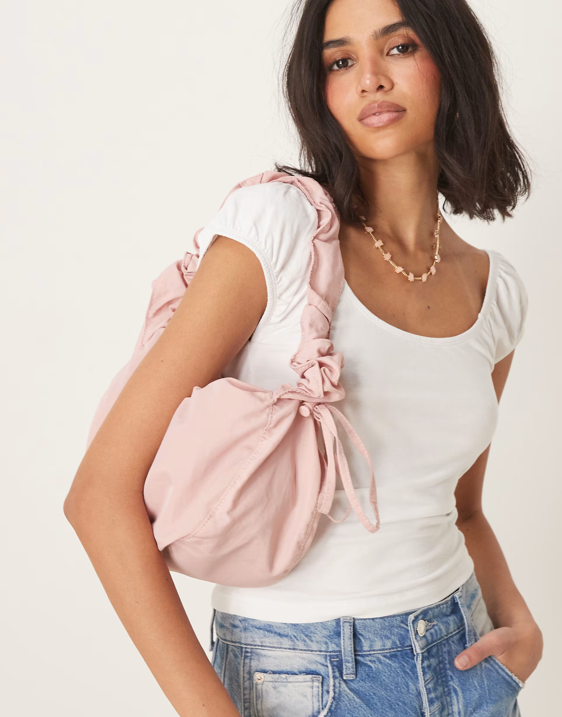 Accessorize ruched 2in1 sling bag in pink | ASOS (Global)