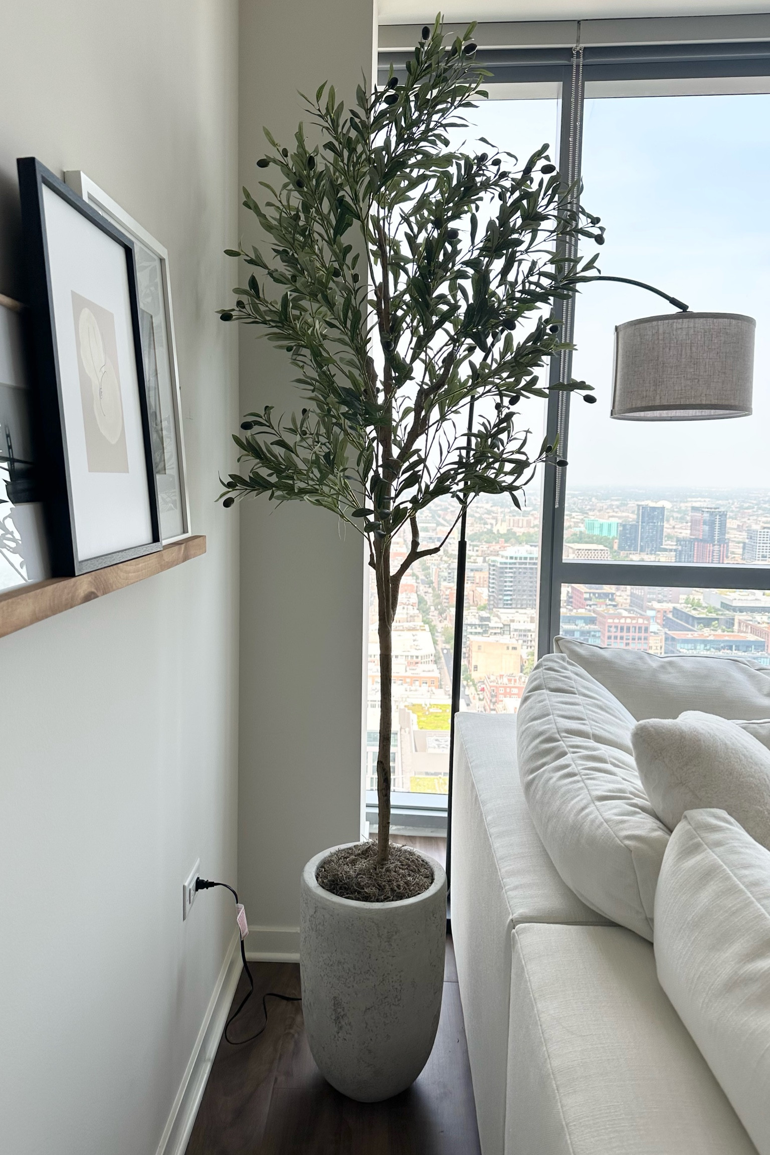 How I put together my fake olive tree 🤍 

1. Fill bottom of planter with cardboard  / anything disposable 
2. Set tree so it’s securely propped on top of cardboard / disposables 
3.  Cover with spanish moss

#LTKhome