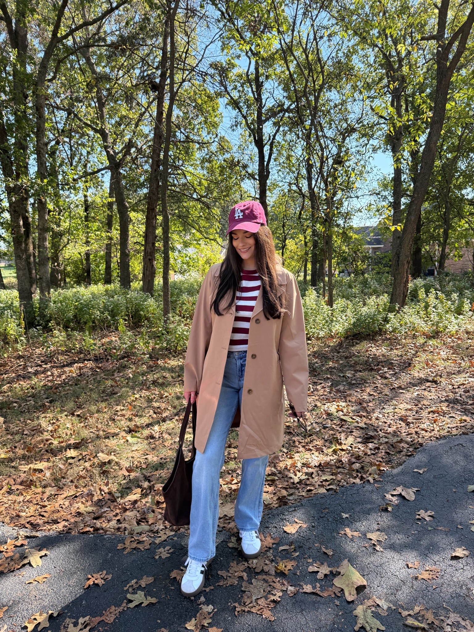 How I’m wearing my trench coat this fall 🫶🏻 love a pop of burgundy

Streetwear, trench coat outfit, causal style, jeans outfit, trendy outfit, fall fashion, fall outfit, sneakers outfit, 

#LTKFindsUnder50 #LTKStyleTip #LTKSaleAlert