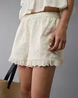 AE High-Waisted Eyelet Ruffle Short | American Eagle Outfitters (US & CA)