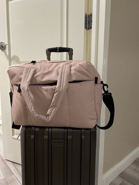 Calpak duffle on sale! This thing holds so much! Is lightweight, has handles and shoulder strap, 9 pockets (including bottom pocket for shoes), has a trolley sleeve for luggage and fits under the seat on the plane! 

#LTKGiftGuide #LTKCyberweek #LTKtravel