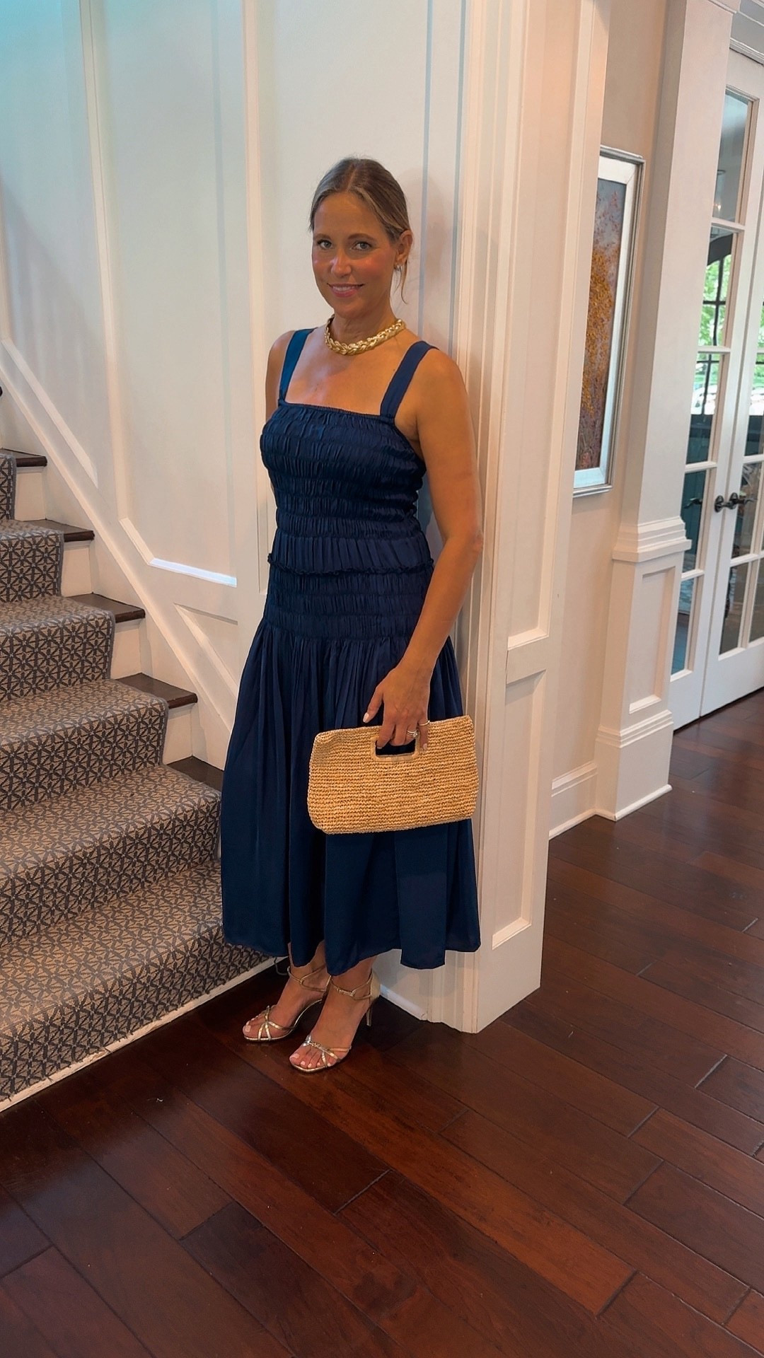 This smocked navy midi dress is so flattering! 

#LTKSeasonal #LTKMidsize #LTKOver40
