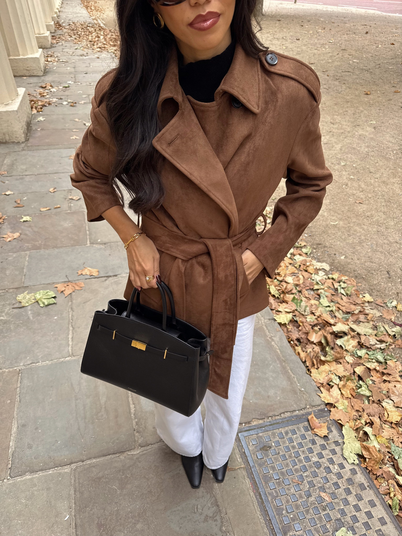 Your most loved autumn outfits 🍂 brown suede belted jacket with white jeans and black leather accessories. Autumn city outfit inspo

#LTKautumn #LTKFashionMonth #LTKjeans