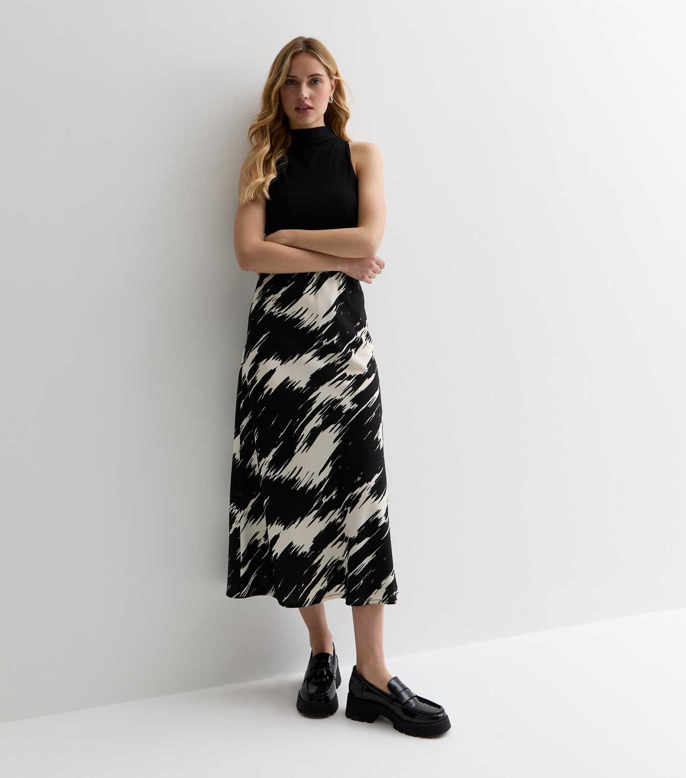 Black Abstract Pattern Midi Skirt 
						
						Add to Saved Items
						Remove from Saved Items | New Look (UK)