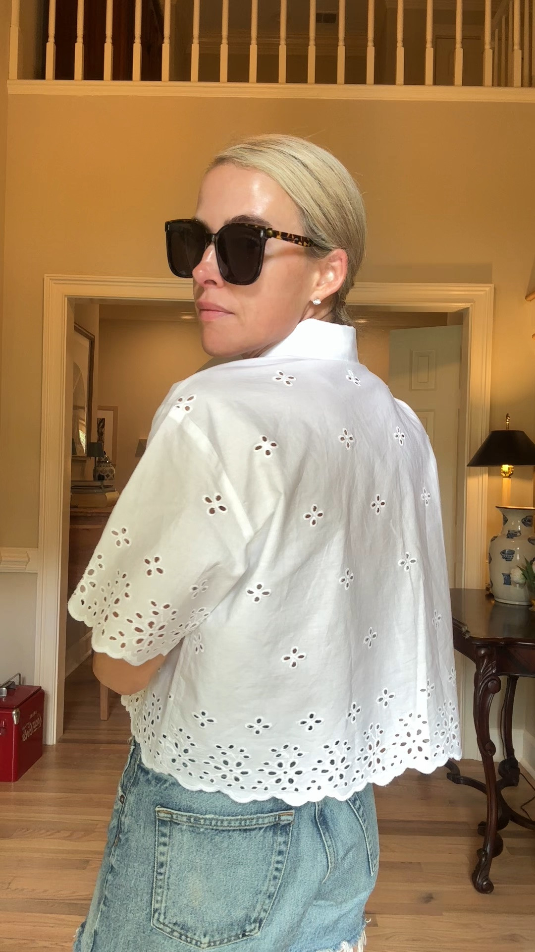 $26 eyelet top from Walmart - runs true to size, perfectly cropped, also comes in Blue ! 
linked my favorite summer sandals, hat and sunnies as well (shorts are AGolde)