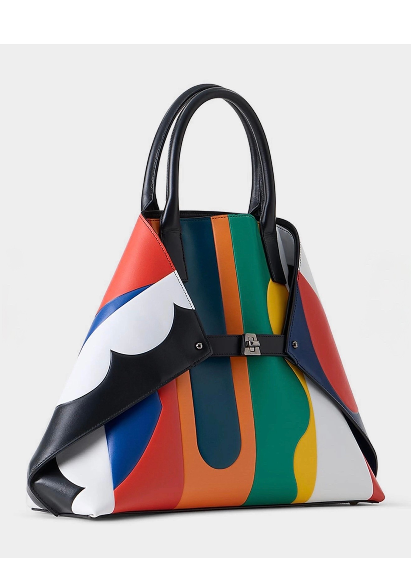 Akris
Ai Medium Patchwork Leather Tote Bag
$3,190
Color: MULTICOLOR

This Akris "Ai" top-handle bag is defined by its vibrant leather geometric patchwork design. Engineered for versatility, its corners fold and secure with a turn-lock closure, effortlessly transforming the silhouette from a classic tote to a sculptural trapezoid


#LTKSeasonal #LTKWorkwear #LTKootd