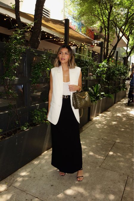 Brunch attire: black midi skirt, a white vest, black high-heeled sandals and my bottega andiamo bag 🖤
 

#LTKstyletip