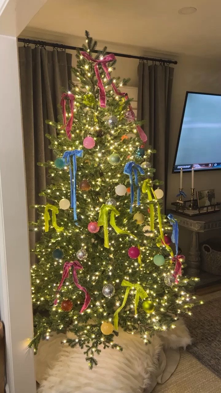 Switching to a pre lit faux tree was the best decision 🎄🎀 tree is easy to assemble and I added twinkle lights for the fun effect ✨ we have the 7.5 ft! 

#LTKhome #LTKHoliday #LTKSeasonal