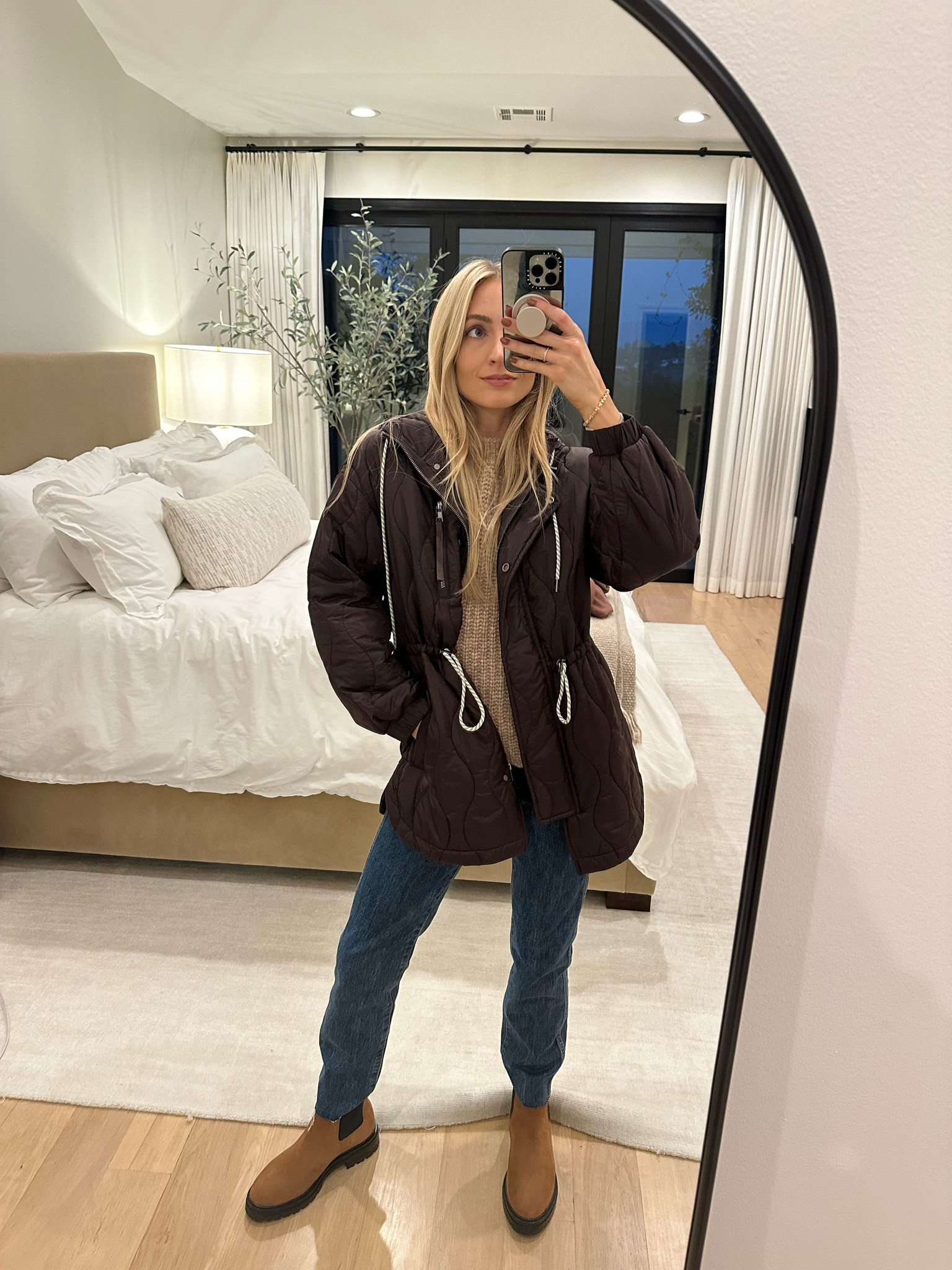 Layered up for the first of chillier nights! 
Love this quilted jacket - perfect layering piece over knits or activewear. I’ve been wearing it for nightly walks around the neighborhood and over my workout clothes in the morning too.

FYI you can use SOPHIE15 on the Jenni Kayne website for the boots! 

Sizes worn here:
Sweater XS (true to size)
Jacket XS (true to size, relaxed roomy fit)
Jeans 24 (true to size)

#LTKstyletip #LTKHoliday #LTKSeasonal