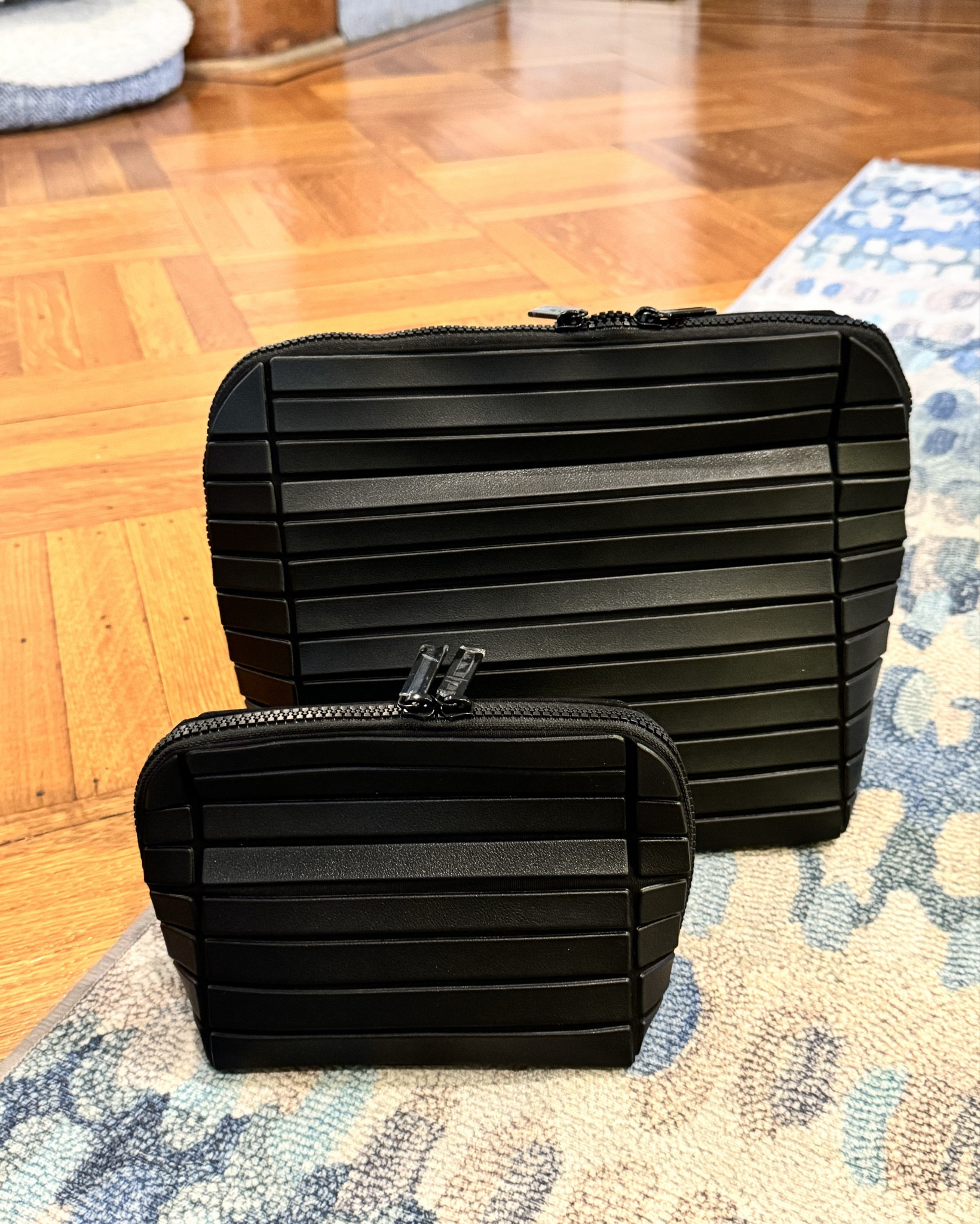 If you’re stuck on Christmas gifts, check out these travel bags from Parallel. 

The smaller one, designed for everyday use, offers meticulous organization and stylish functionality in the most compact size. With 9 pockets, 2 mesh pouches, and 2 flexible compartments, along with 5 elastic loops, it's the perfect companion for daily activities. Small enough to fit inside your tote or bag, it keeps your essentials organized and easily accessible throughout the day, whether you're at work, running errands, or simply out and about.

The large-sized, is designed for extended trips and for overpackers. The large Traveller amply accommodates all your toiletries vertically in one place. With our patent-pending foldable shape, the bag effortlessly unfolds and reveals a meticulously organized interior. Everything inside remains visible and accessible at all times, eliminating the need for unpacking.

9.5" height provides plenty of headroom for toiletry products, professional length brushes, hairbrush, skincare regimen, cosmetics, and more.

Travel packing organization storage makeup bag case vanity cosmetic bag 

#LTKTravel #LTKGiftGuide