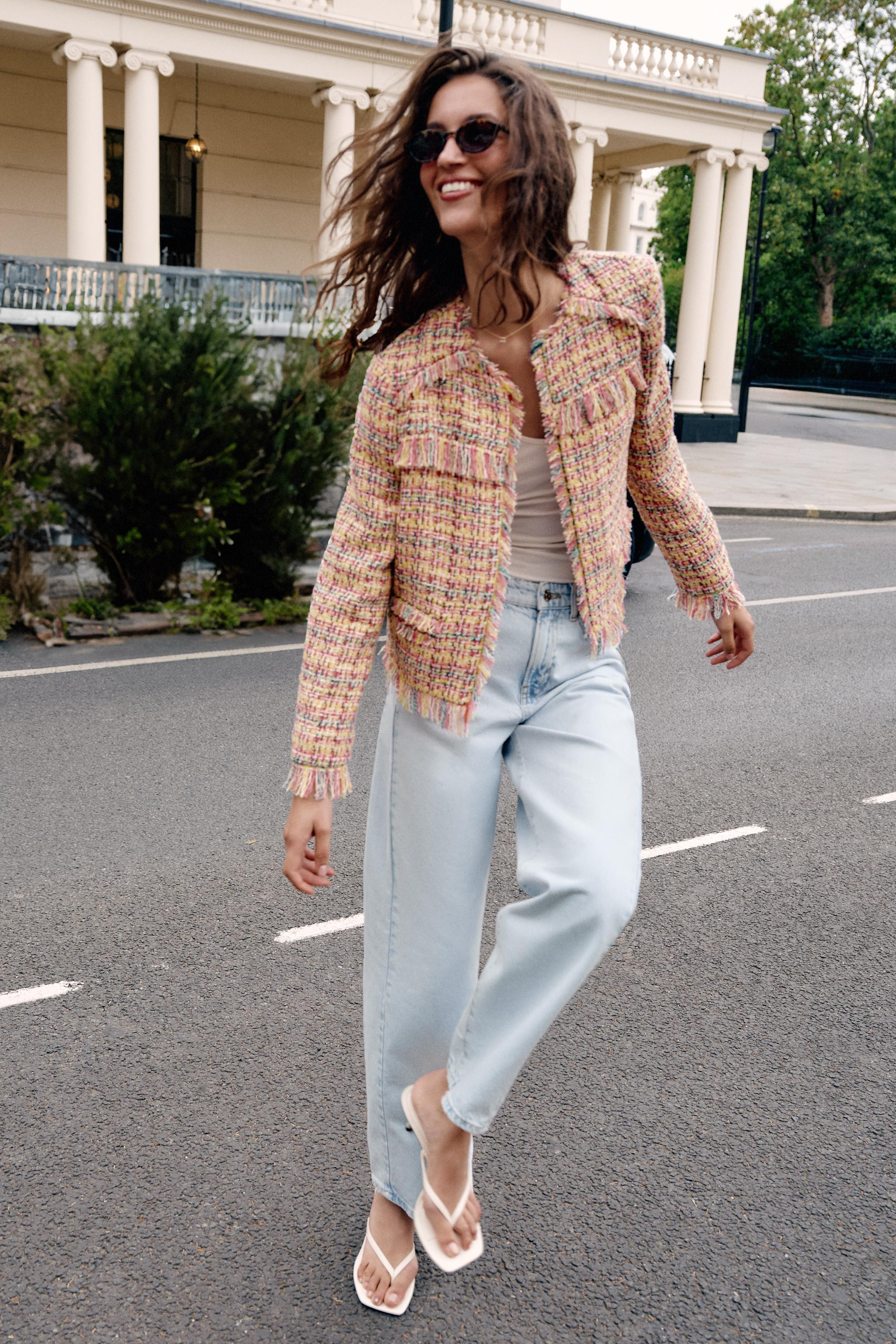 Open blazer in a textured fabric with fringe trim. Featuring a round neck, long sleeves, and fron... | Zara US