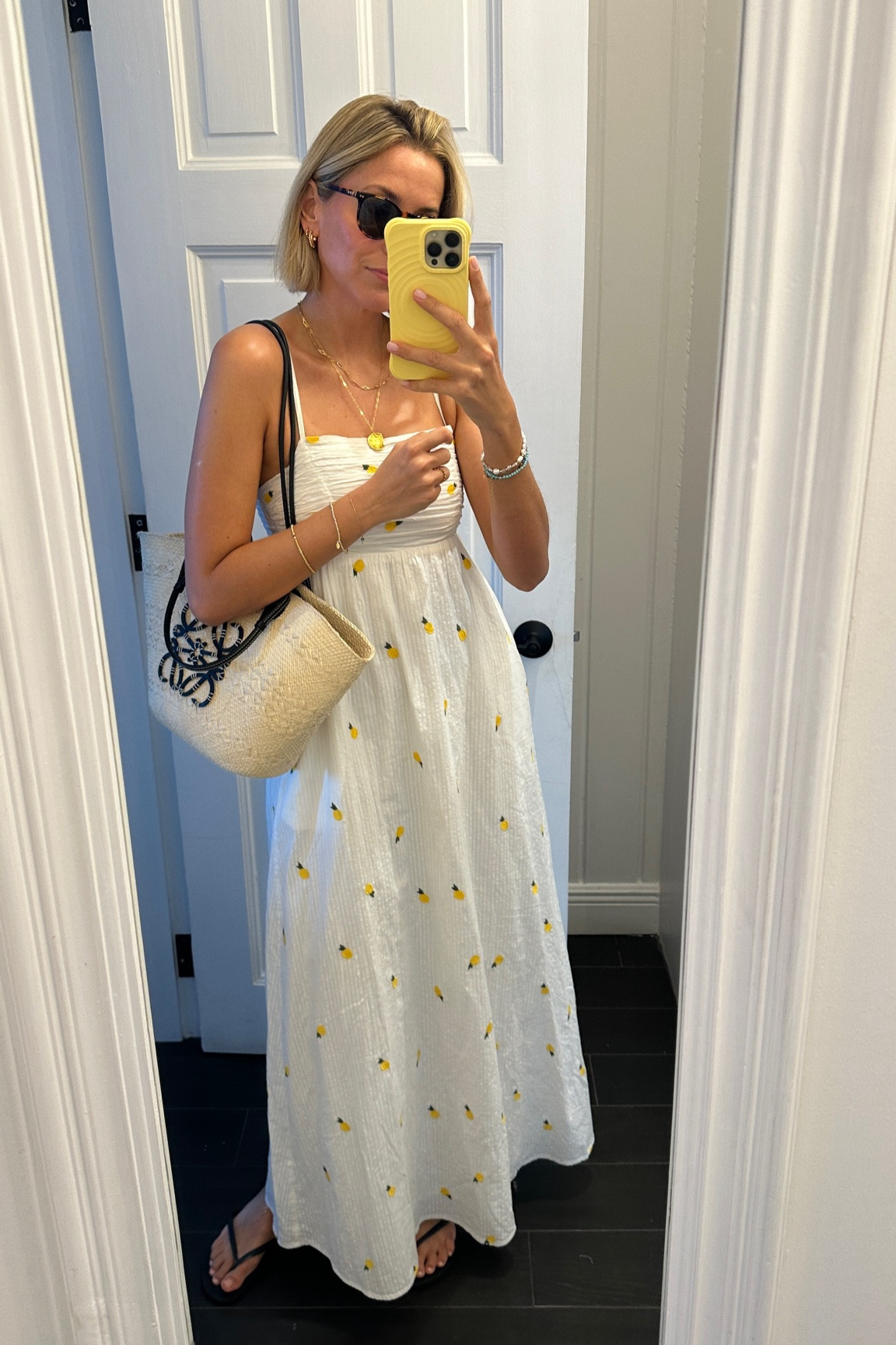 White maxi dress with lemons embroidery, basket bag, summer jewellery, shell necklace 

#LTKeurope #LTKuk #LTKsummer