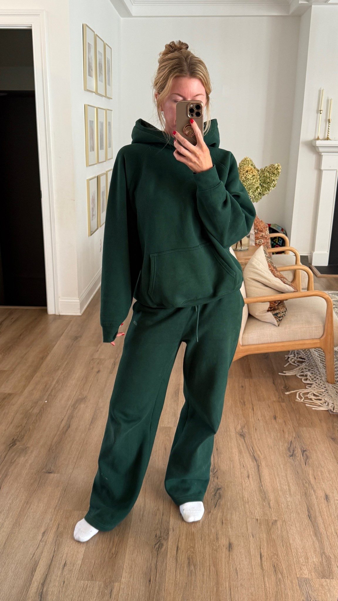 This is my favorite sweatshirt combo when I am feeling cold and I am hanging around the house all day. This specific green was from last year’s drop, but I linked their new dark green shade and I actually love it more. The color is mineral green.
Sweatshirt: runs very oversized in the best way, wearing a small. 
Sweatpants: Ron, true size, wearing a small, these are a wide straight leg without feeling too sloppy wide for me. 

#LTKSeasonal #LTKTravel #LTKStyleTip