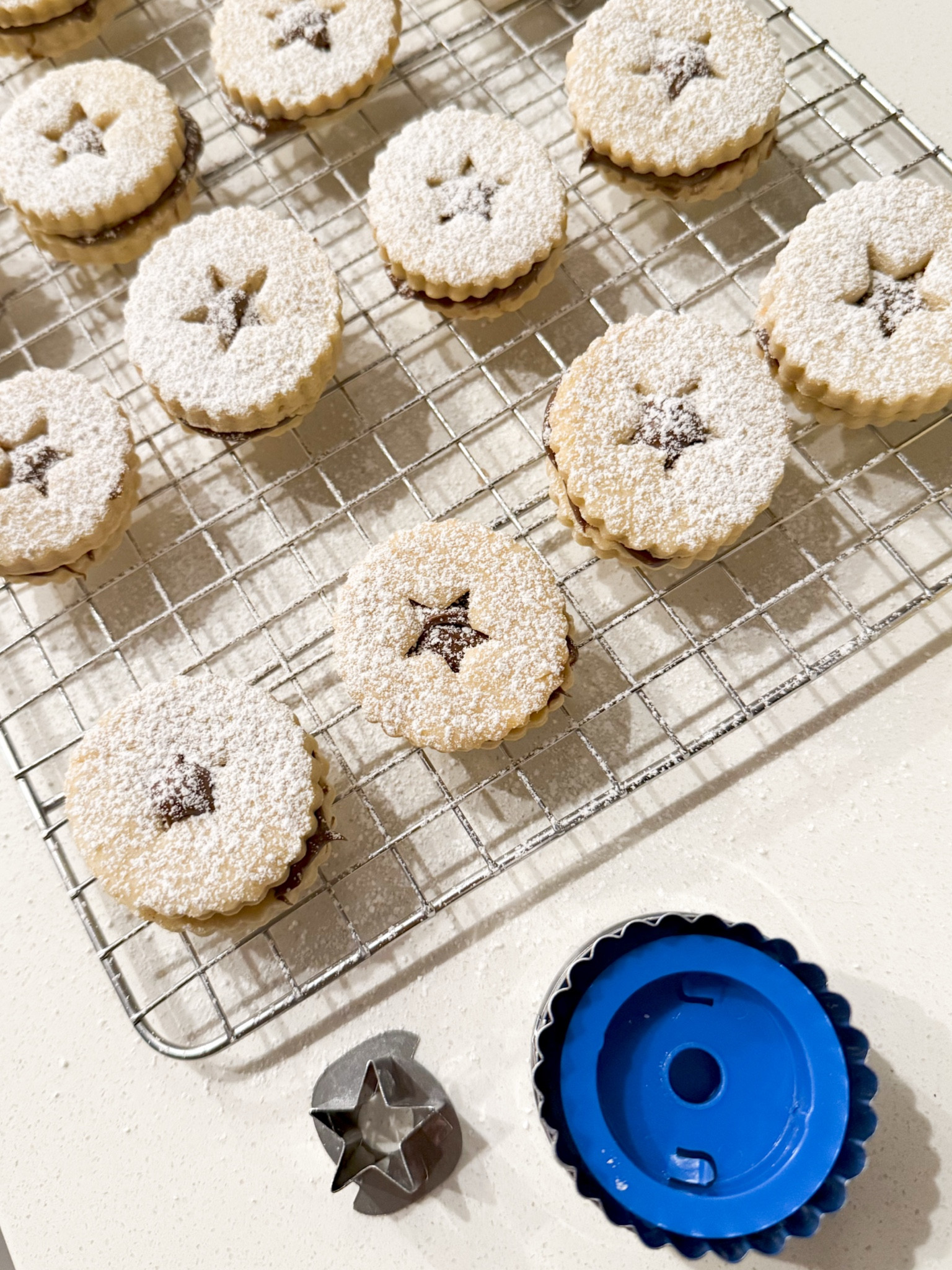 Made these Linzer Cookies tonight with hazelnut spread using these cookie cutters - perfect for a holiday party, cookie swap, or homemade gift 

#LTKHoliday #LTKSeasonal #LTKParties