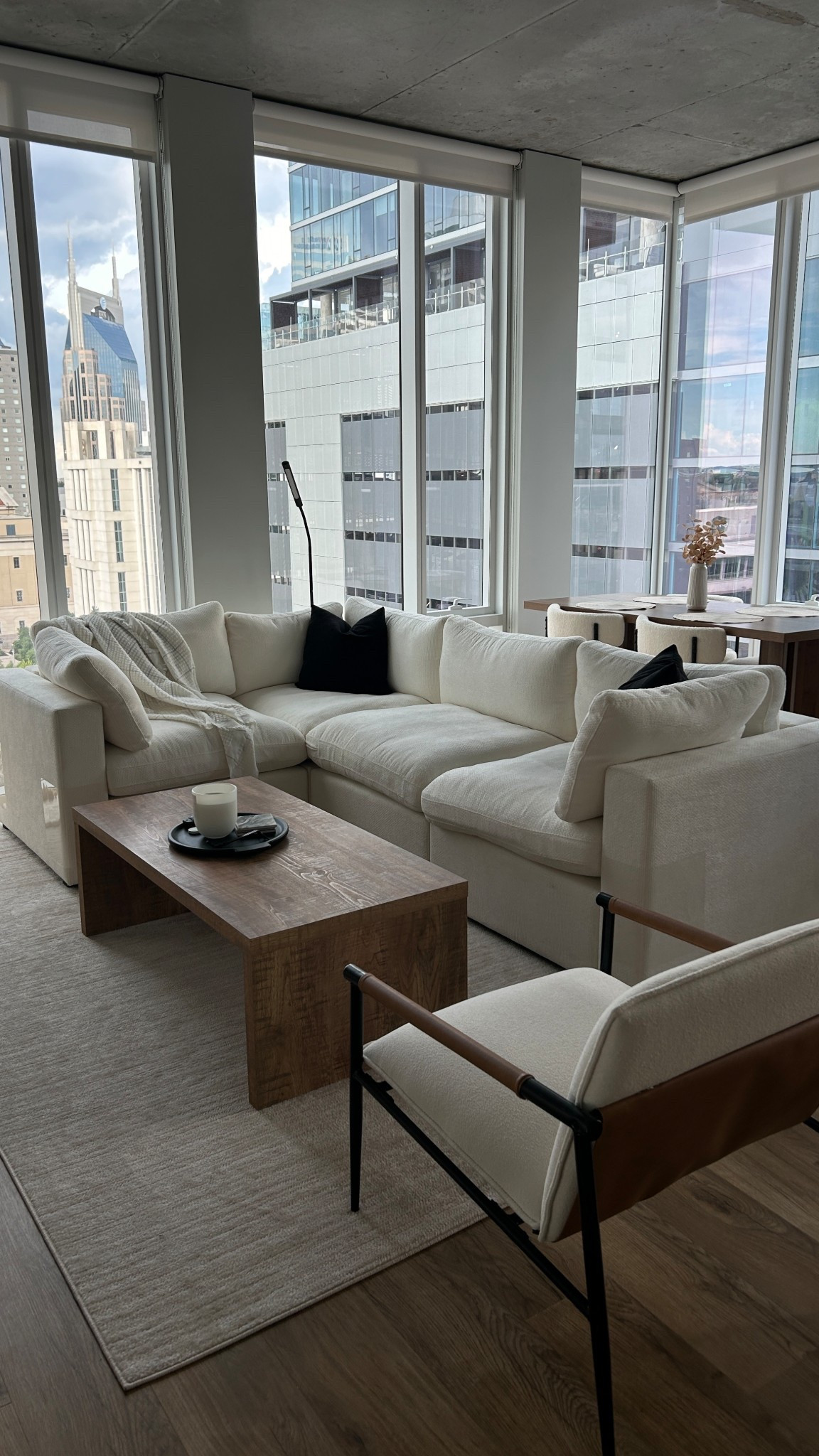 our little apartment living room! #moderndecor #whitecouch #neutralfurniture #apartmentliving #apartmentdecor #smallspace 