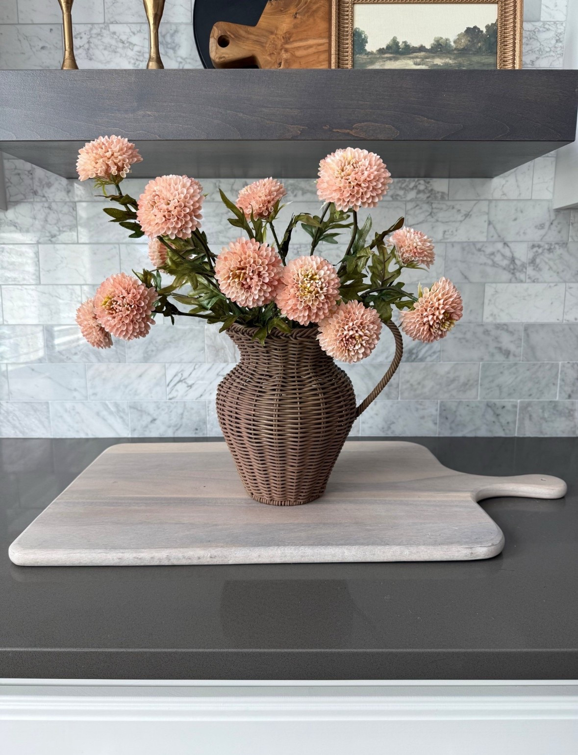 A quick color refresh to upgrade this $18 rattan pitcher! I also cannot get over how realistic these faux zinnias are! I have 2 bundles here! 

#LTKSeasonal #LTKHome #LTKGiftGuide