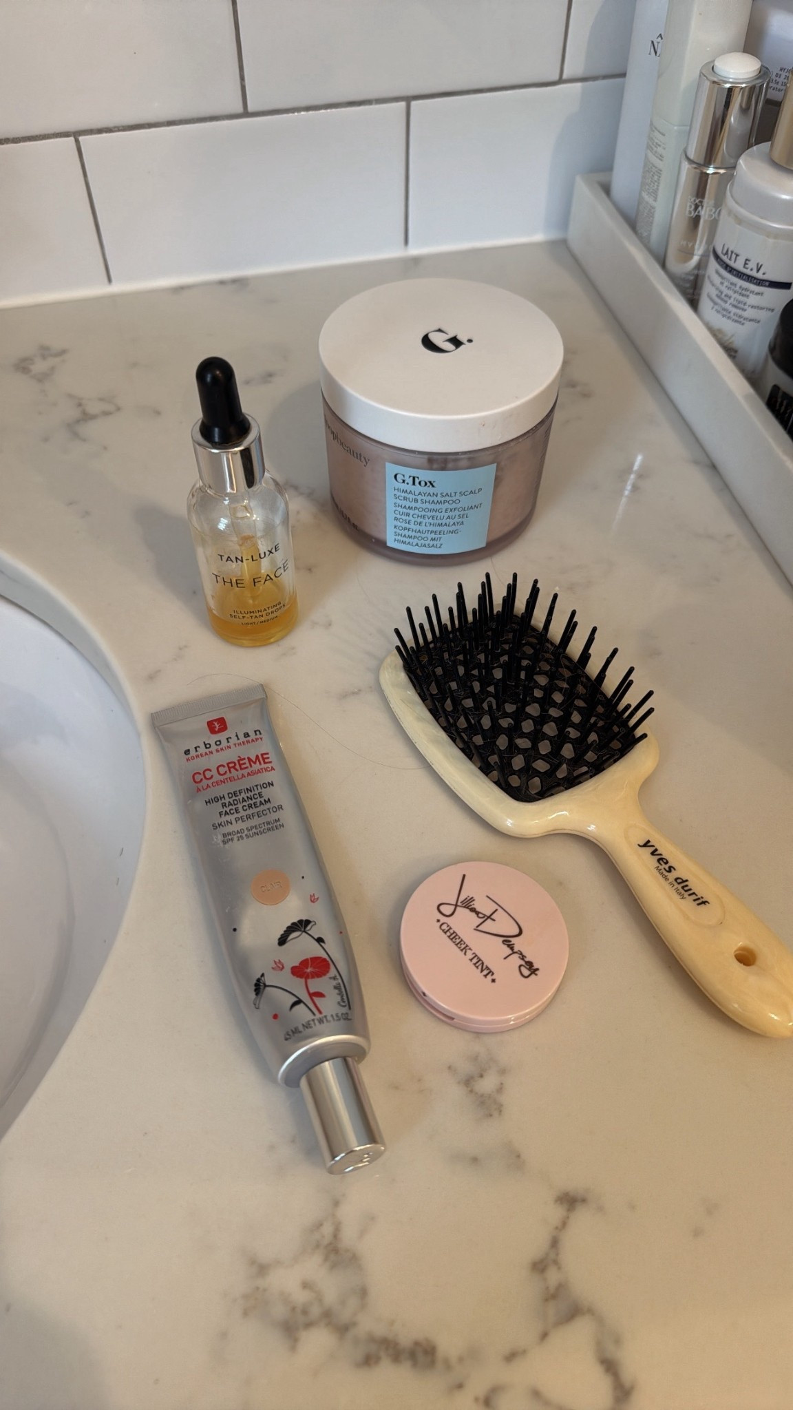 All 25% off with code HOLIDAY.

Don't want to be without any of these beauty holy grails. 

The Erborian CC cream blurs all ruddiness and creates the most even complexion. 

I use the scalp scrub once a week to really detox and cleanse the scalp.

The YVES Durif brush is the most incredible brush for detangling without any snagging.

Two drops of the tan luxe mixed with moisturizer and I don't look like a sick human. Gives such a nice, natural glow!

I keep the Jillian Dempsey brush in my makeup bag for an instant pick-me-up. It's impossible to mess up. 

#LTKCyberWeek #LTKBeauty