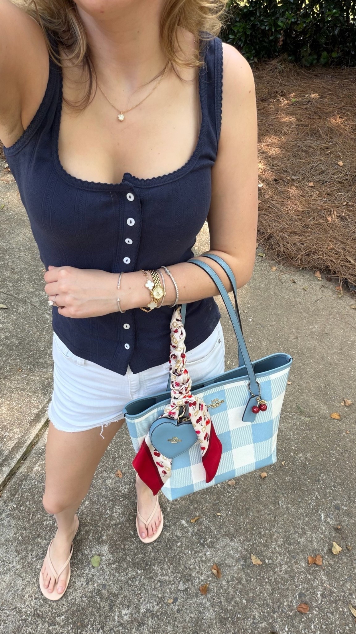 OOTD
Coach outlet medium city tote in gingham

Cider pointelle button up tank 
White denim shirts
Memory foam flip flops (the comfiest from Amazon)!

#LTKootd #LTKmomlife #LTKmorningroutine