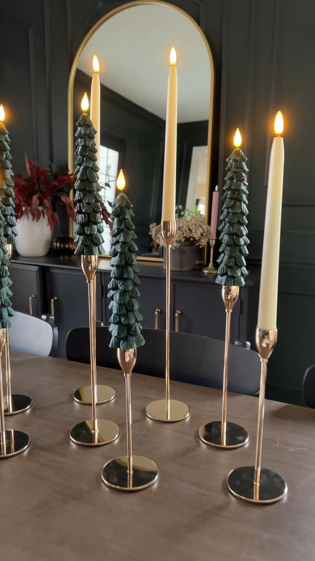 These flameless battery powered taper candles will elevate your holiday table! With a flicker mode and solid flame mode, remote and timer, you can set them and forget them! And the candle holders are a steal! 

#LTKHoliday #LTKSeasonal #LTKCyberWeek