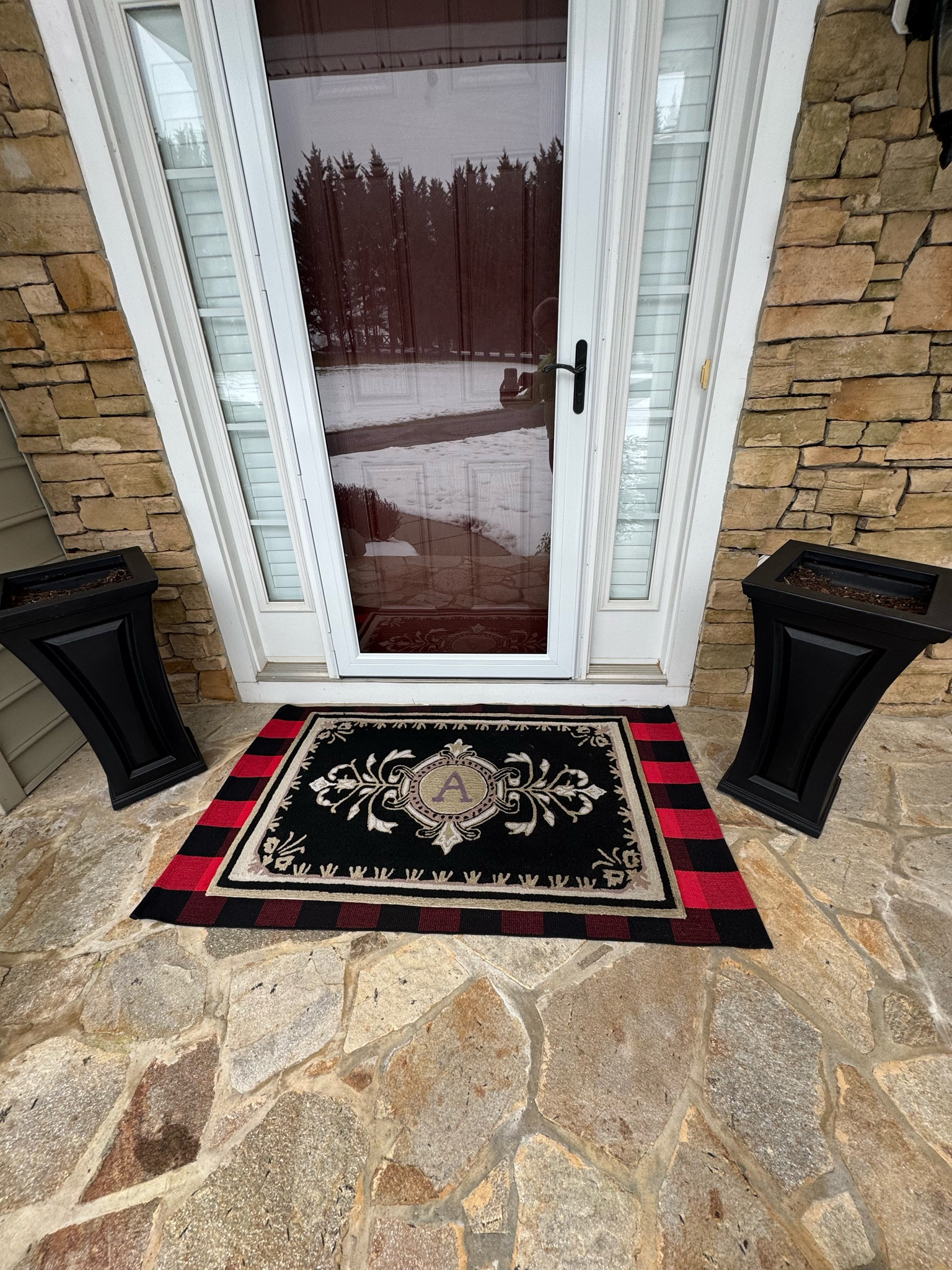 Transforming my front door for the Valentine’s season! 

Repurposed my red & black check rug from Christmas under my monogram mat for a cozy touch. 🖤 

The black urns are empty for now — too cold and windy for flowers, but they’ll be back in full bloom soon! 🌿

#LTKHome #LTKSeasonal