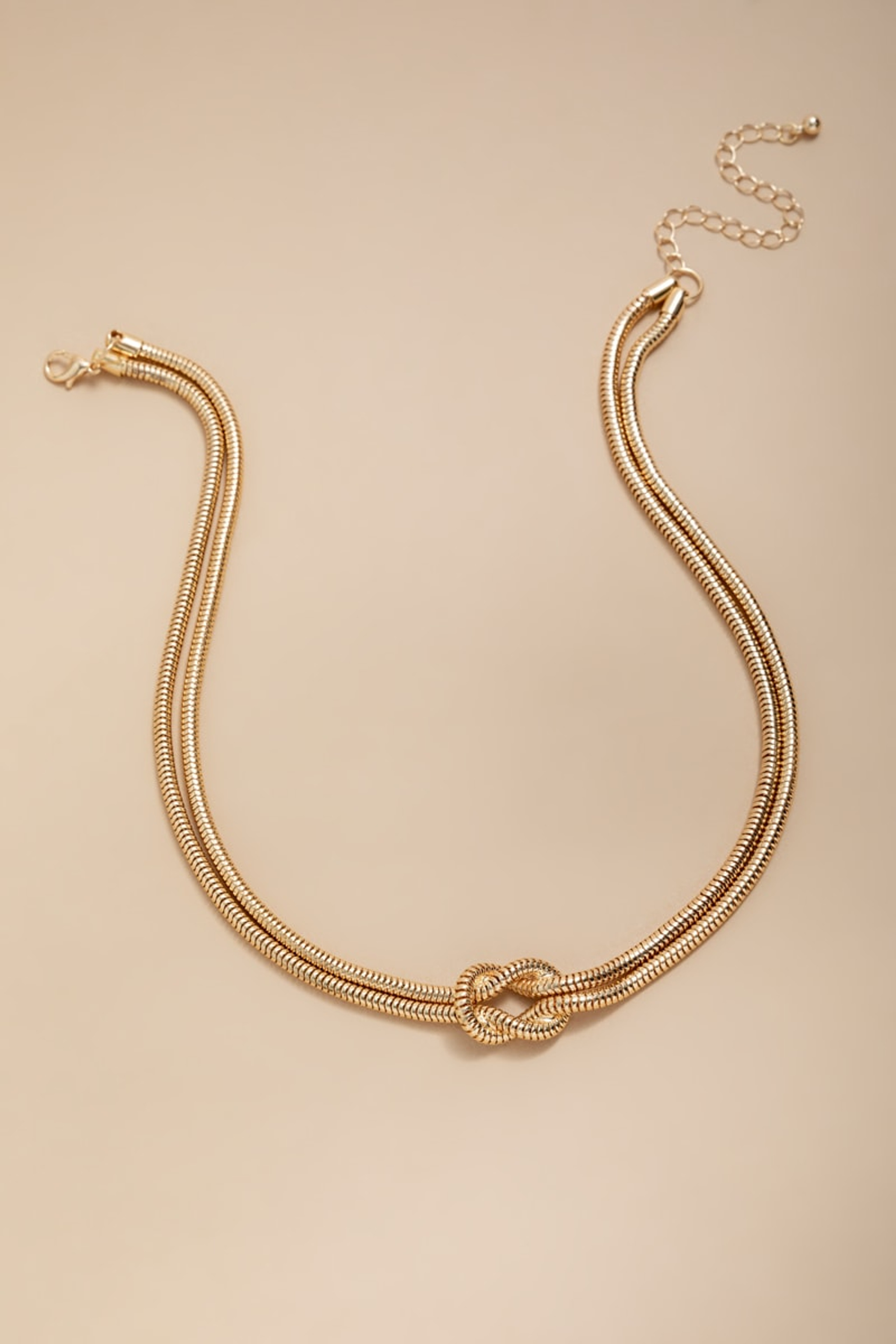 Carissa Double Tube Knot Pendant Necklace | Francesca's