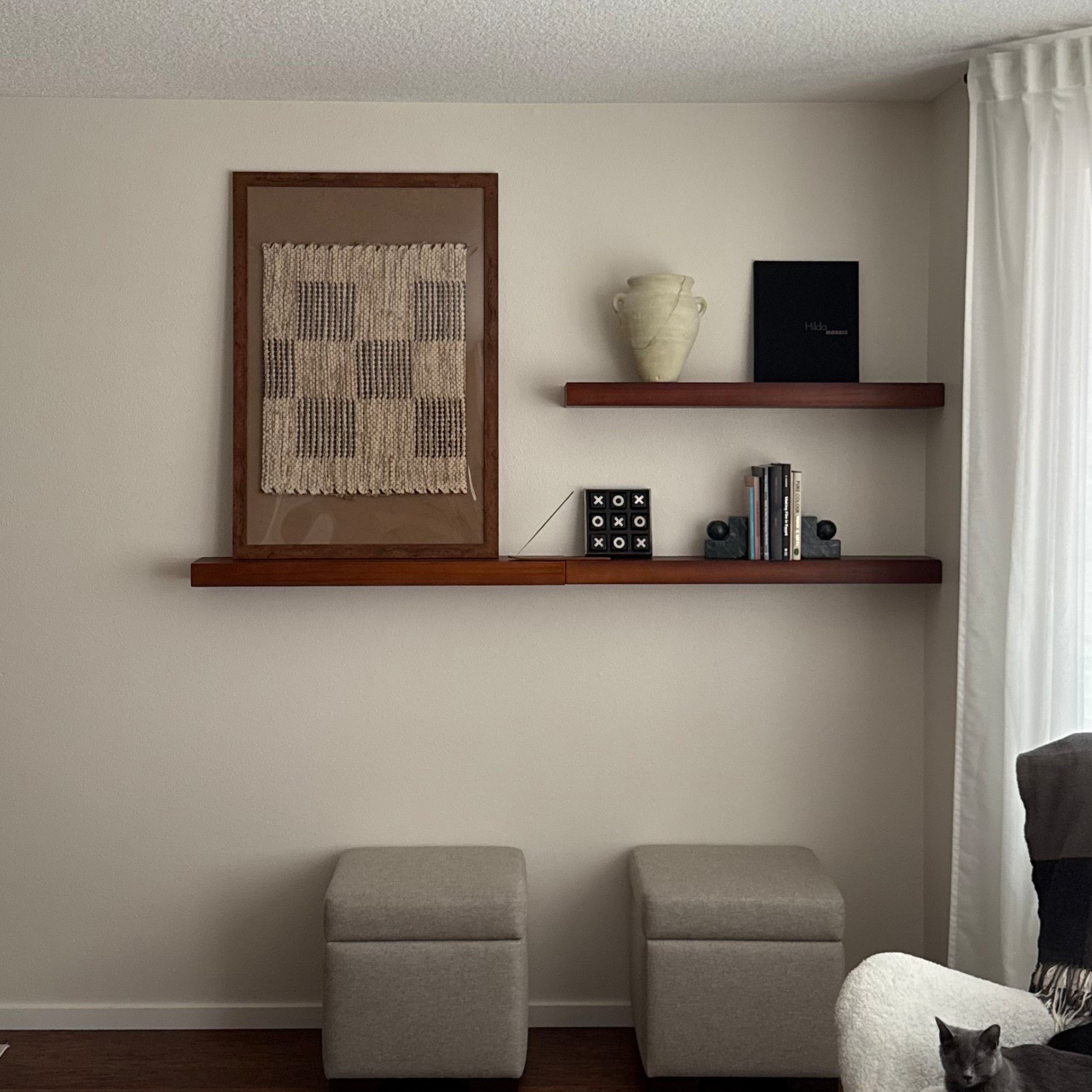 Wooden floating shelves and simila ottomans linked: 

#LTKHome