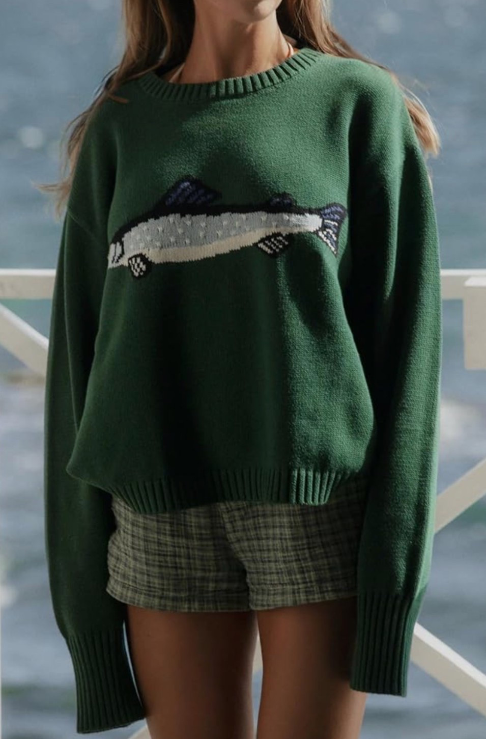 Find in my Lake + Pine Collection. ⛰️  Pine trees, lake air, and cozy cabin mornings. This oversized fish print graphic sweater brings the perfect mountain-lake getaway vibe with its vintage feel and relaxed knit fit. Pair it with light boxers for an effortless lounge look made for sipping coffee on the porch, watching the water, or curling up inside the cabin after a day outdoors. Soft, easy, and full of rustic charm.

Shop now and bring the getaway feeling home. 🌲

#LTKSeasonal #LTKU #LTKMidsize