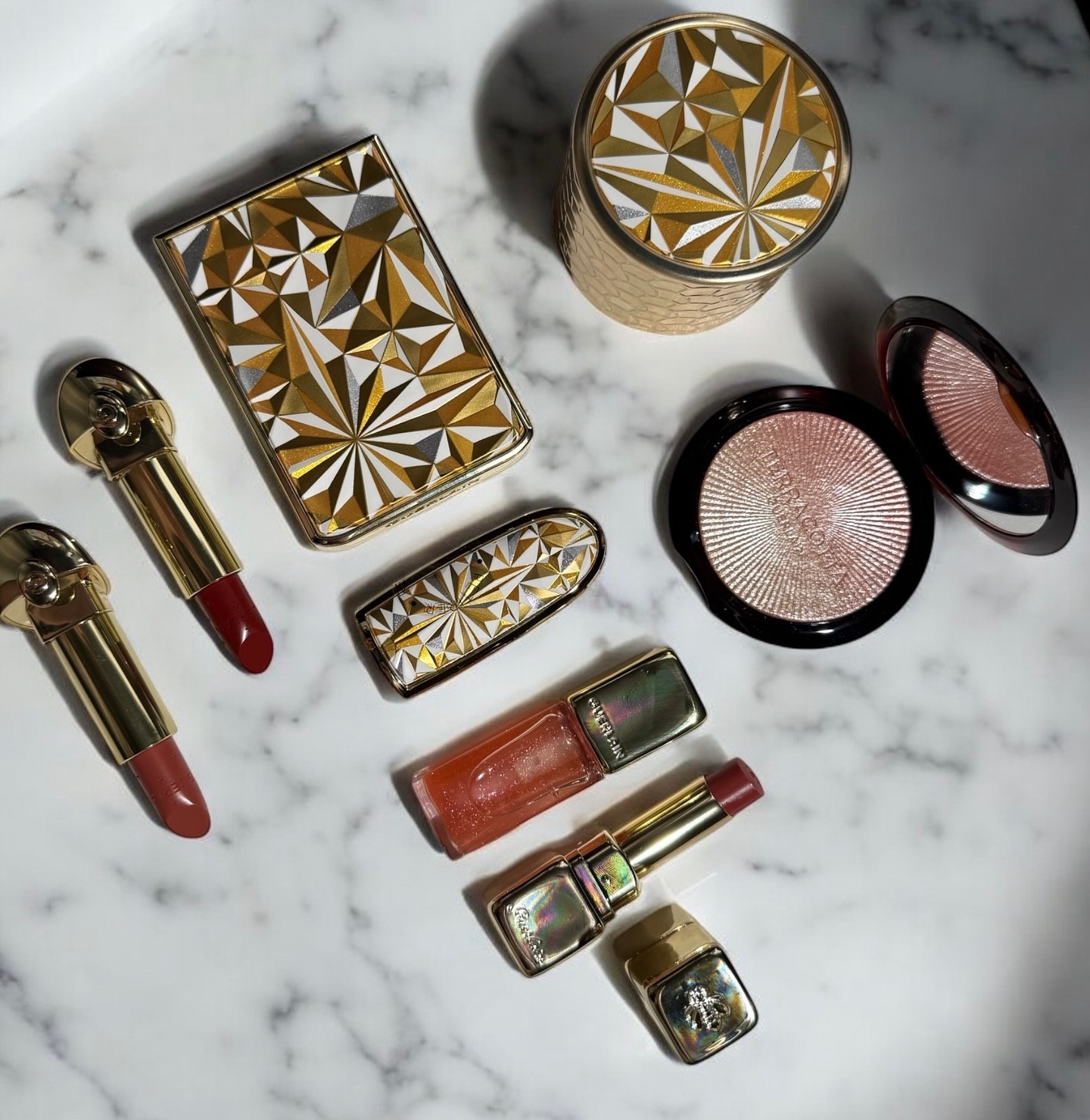 New Guerlain “Tale of Wonders” Holiday Collection Review and Makeup Look @guerlain 

Ombres G 520 Stellar Glow 
Terracotta Luminizer Rosy Gleam 
Météorites Midnight Glow 
Rouge G Satin Lipstick Le Nude Songe 
Rouge G Satin Le Rouge Étoilé 
kiss kiss Bee Glow 129 Blossom Glow
kiss kiss Bee Glow Oil 429 Sparkling Rosewood 
Rouge G Stellar Case 

Guerlain delivers a collection that feels like stepping into a winter fairytale it’s a little ritual of elegance,warmth,and sparkle.The packaging is dreamy,think rich jewel tones mixed with frosted gold accents, a luxe finish that instantly sets the mood for the holidays.Every piece feels like it was made to be displayed, not just used.

The Eyeshadow: The textures are smooth,the formula isn’t glittery, and the shades blend effortlessly. Every color feels carefully curated for soft holiday glam ,it’s elegant and refined.

Météorites Glow: The iconic illuminating pearls add a soft, radiant finish to the skin.They catch the light beautifully and give a natural, elegant glow.

Terracotta Luminizer: A lovely, gorgeous shade that can also be used as an eyeshadow topper. In my opinion it’s a little chunky and glittery but still beautiful and very unique.

Lipstick and Lip Oil (with the case): Just stunning. I’m in love with the shades and formulas as always.The lip oil and Bee Glow have a slight tinted color, like a pH-reactive formula ..I’m loving the new shades.

Overall: This collection is elegant, refined, and festive without being over the top. It’s ideal for anyone who loves a warm glow, high-quality formulas, and luxurious presentation. While it leans toward classic shades rather than bold trendy colors, it delivers timeless holiday beauty that feels thoughtful and indulgent.

Some of the products kindly gifted By the Brand |Details Linked 

#guerlainbeauty #guerlainholidaycollection #makeuplook #swatches

#LTKGiftGuide #LTKSeasonal #LTKBeauty