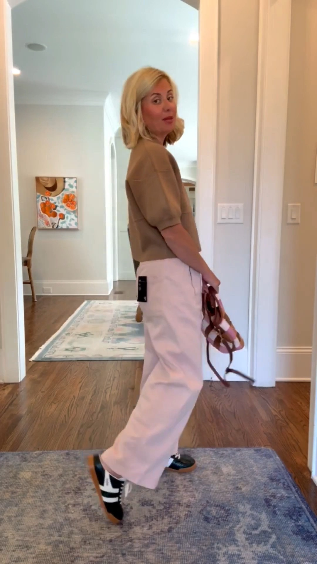My new favorite top from Anthro paired with the ever so popular Izzie pants! 
Top - xs
Pants - small petite 
Sneakers - 8 tts 

#LTKPetite #LTKOver40 #LTKSeasonal