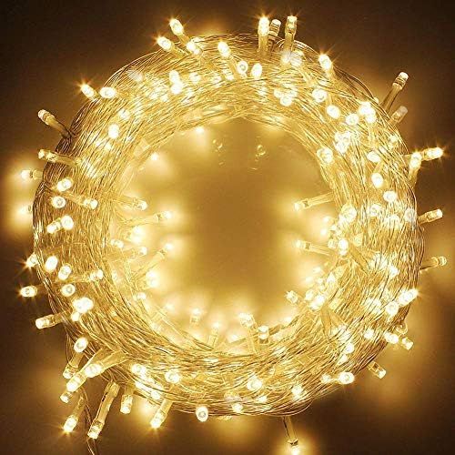 Amazon.com: Twinkle Star 66FT 200 LED Indoor String Lights Warm White, Plug in String Lights 8 Mo... | Amazon (US)