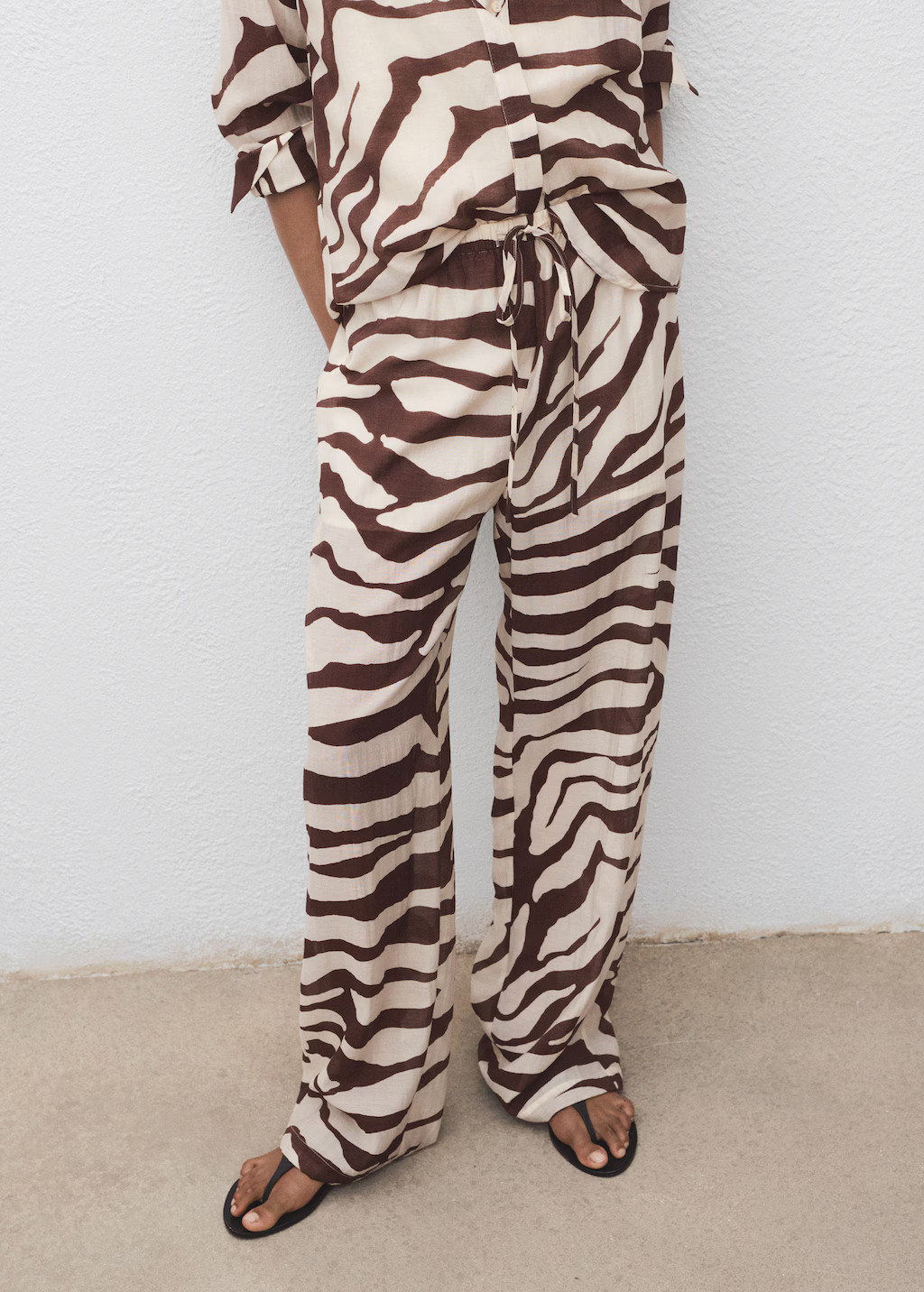 Zebra-print fluid pants | Mango (US/MX/AU)