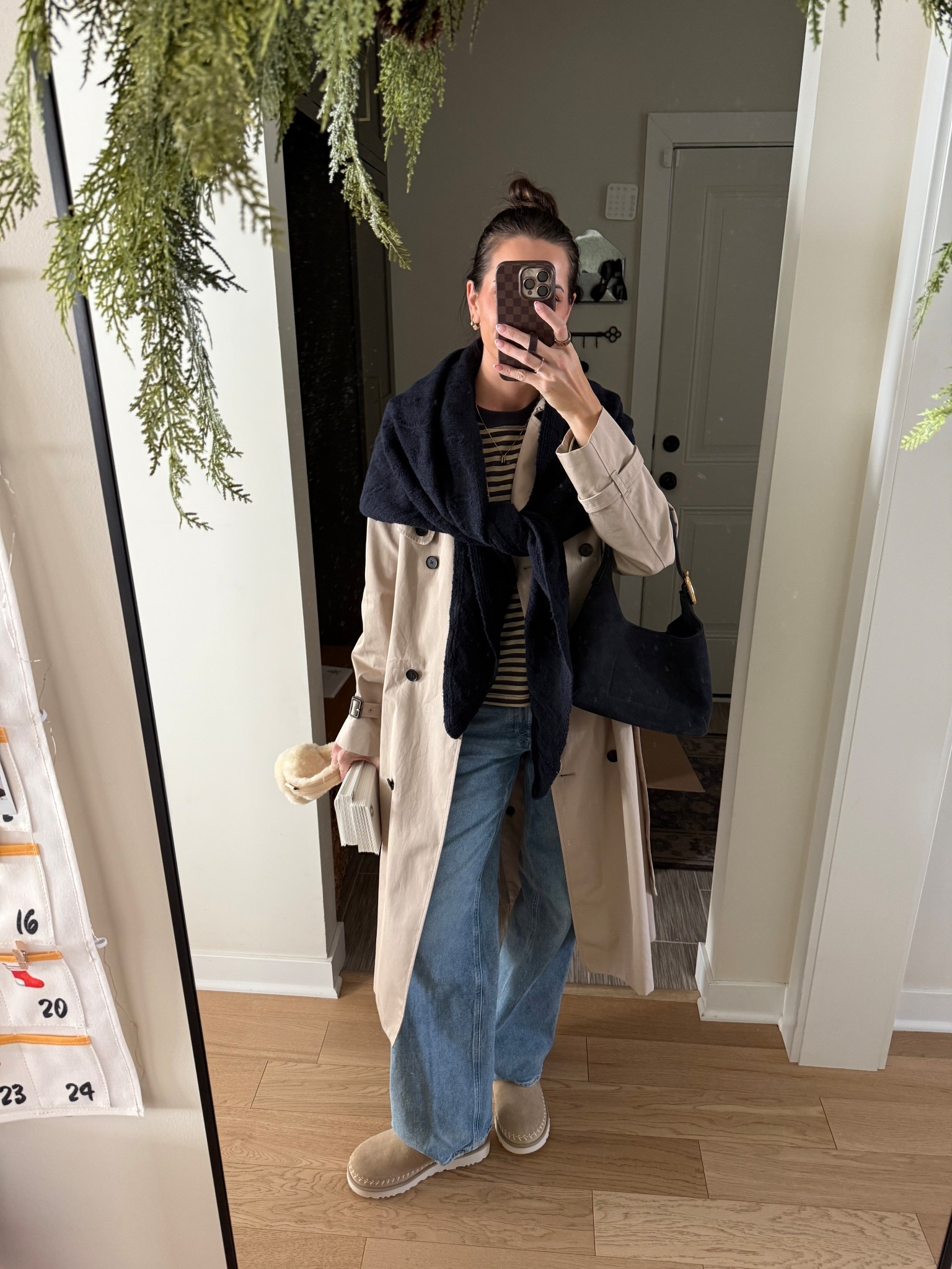 Outfit of the day 💙 Really into these triangle scarves that add a layer of warmth and style without the bulk! 

Trench coat: true to size (S)
Amazon stripe top: sized up (L) 
Jeans: true to size (27) 
Mini ultra mini Uggs: size down for half sizes 

#LTKmomlife #LTKSeasonal #LTKootd