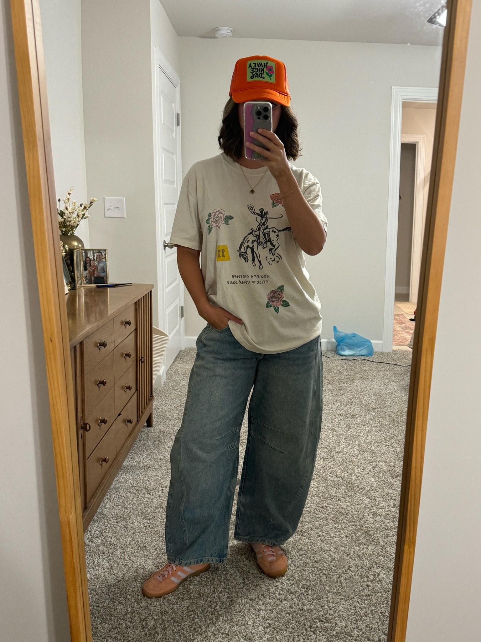 Free people battle jeans outfit inspo with trucker hat and adidas sambas🧡
